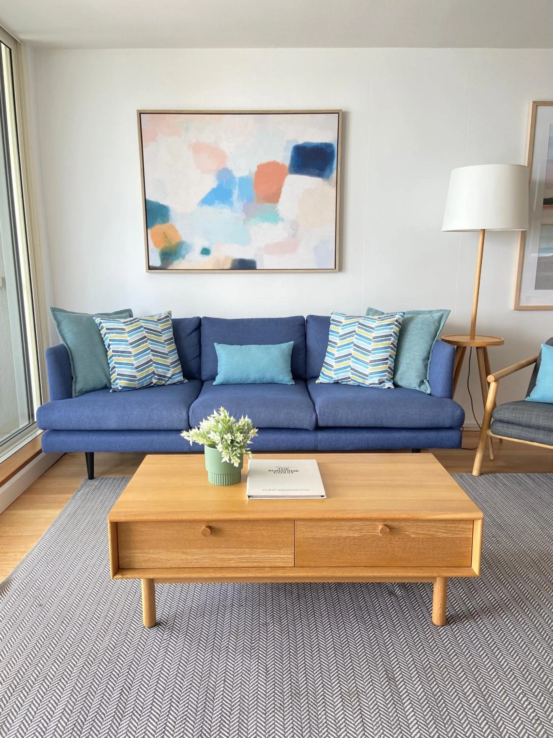 Living room in 84 The Spit Holiday Apartments