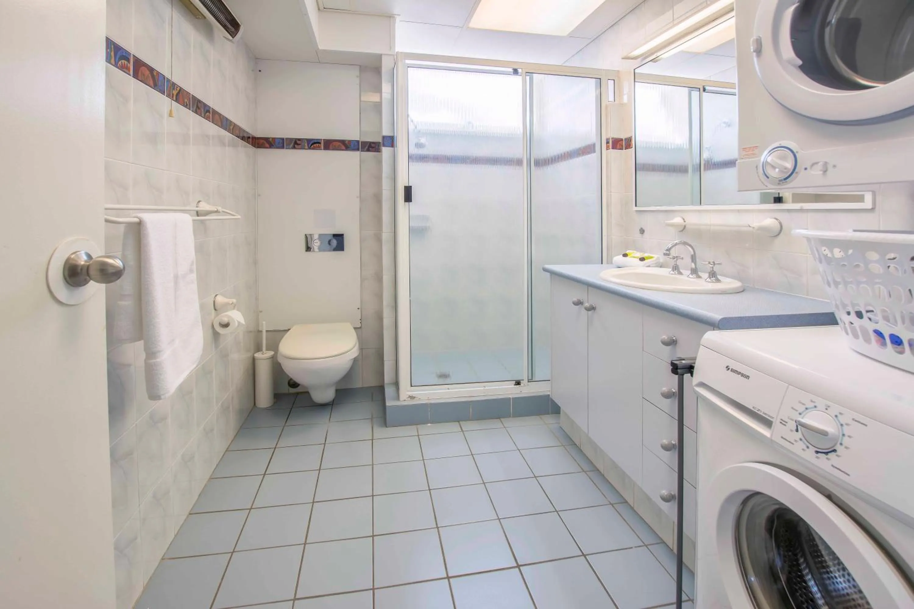 Bathroom in 84 The Spit Holiday Apartments