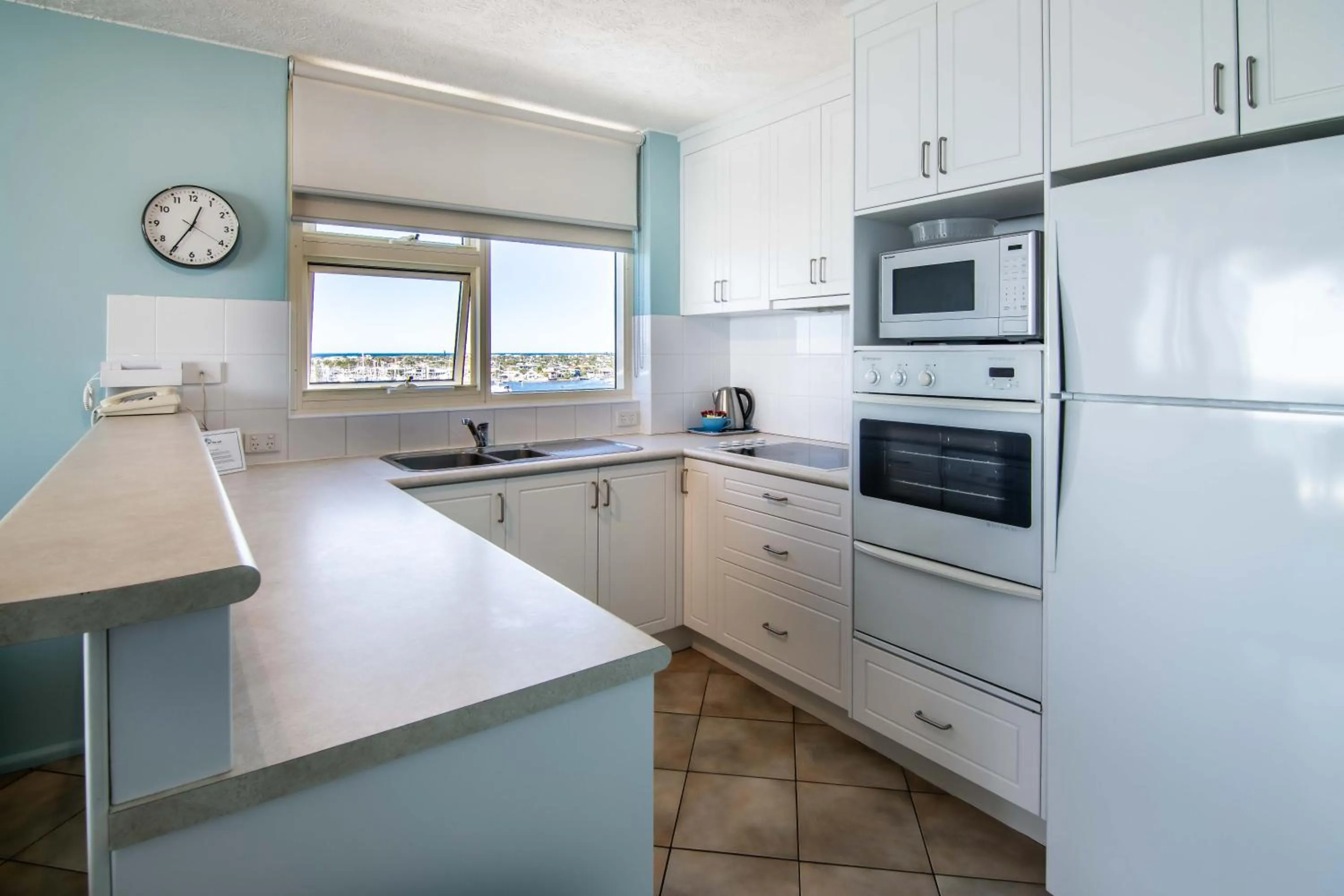 Kitchen or kitchenette in 84 The Spit Holiday Apartments