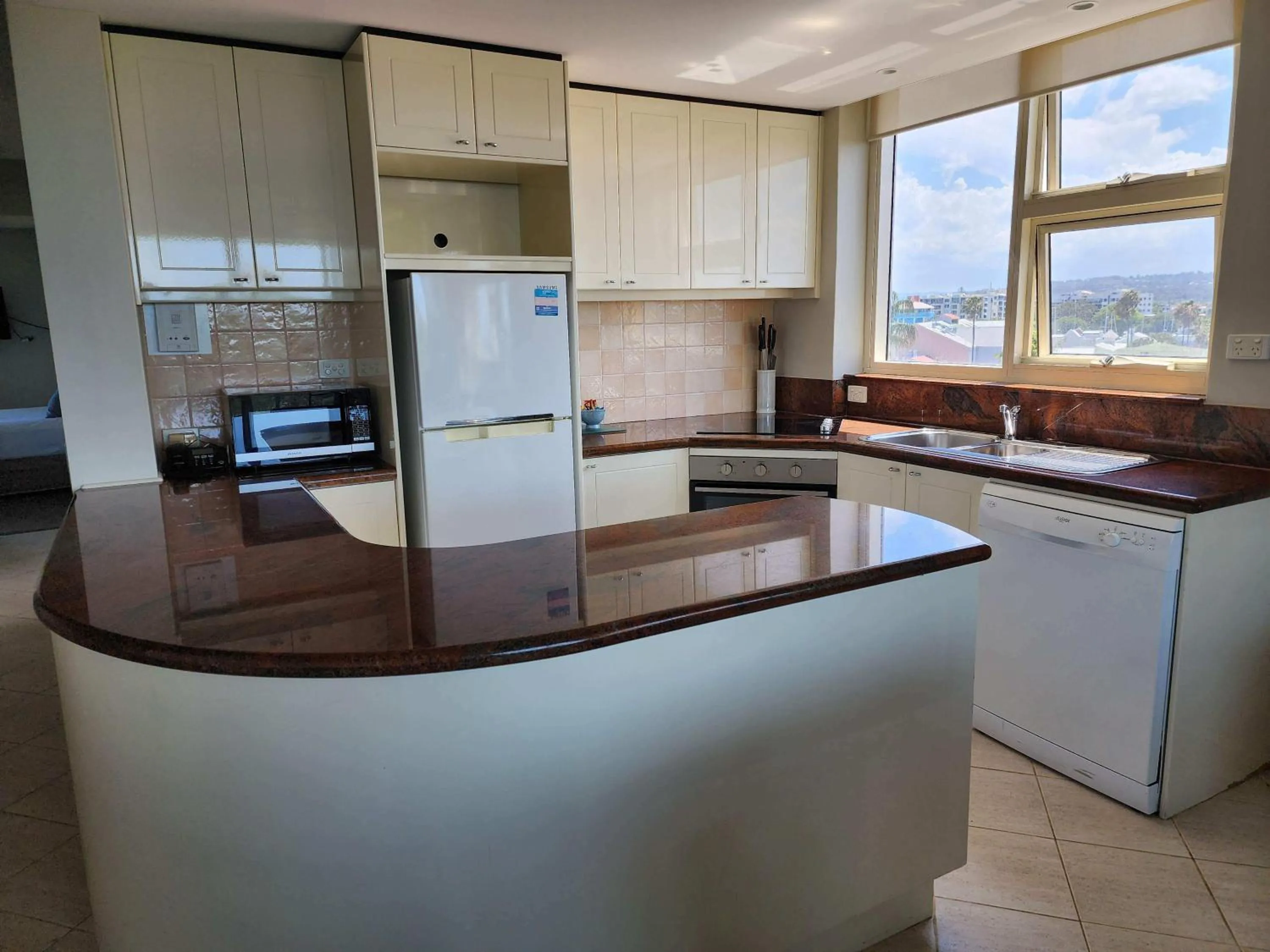 Kitchen or kitchenette in 84 The Spit Holiday Apartments