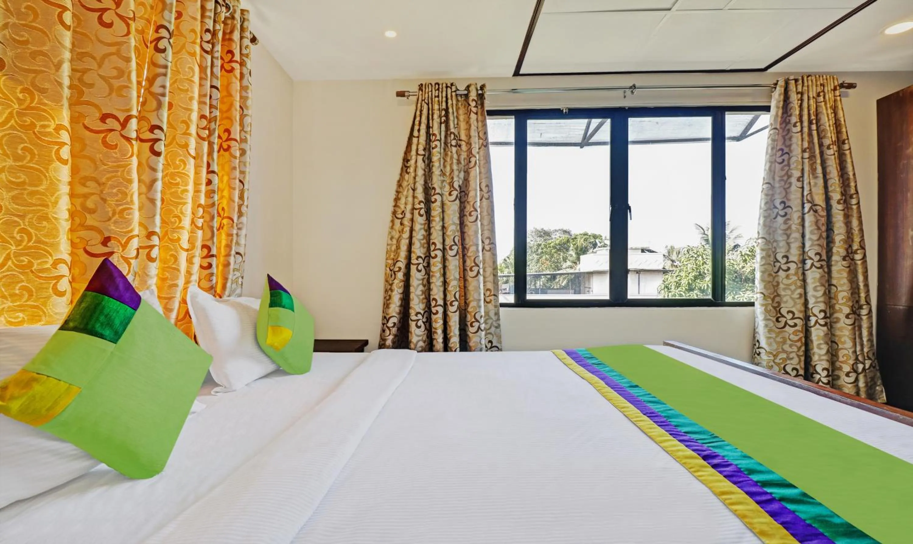 Bedroom, Bed in Treebo Time Square Marine Drive