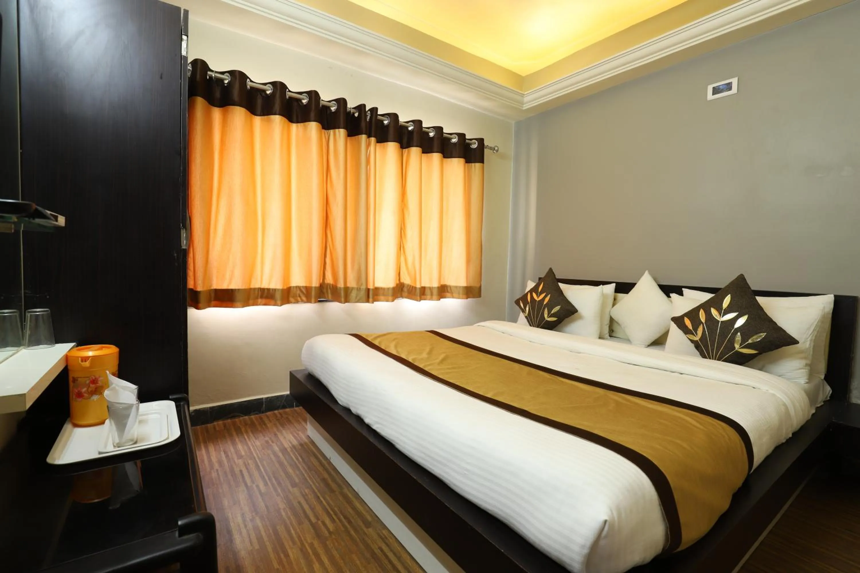 Bed in Hotel Loyal Residency