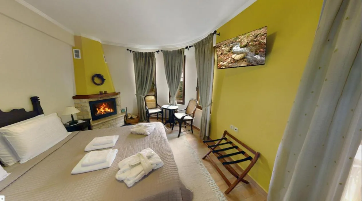 Photo of the whole room, Bed in Melegos Inn Hotel