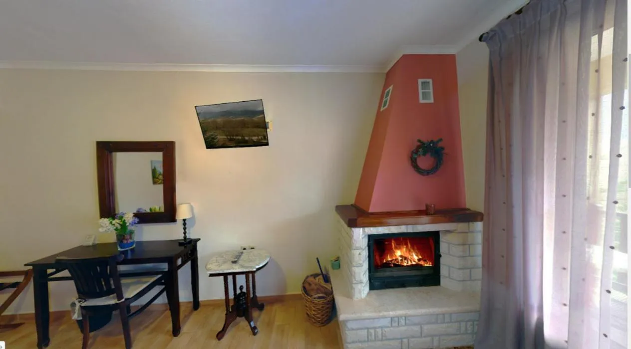 fireplace in Melegos Inn Hotel