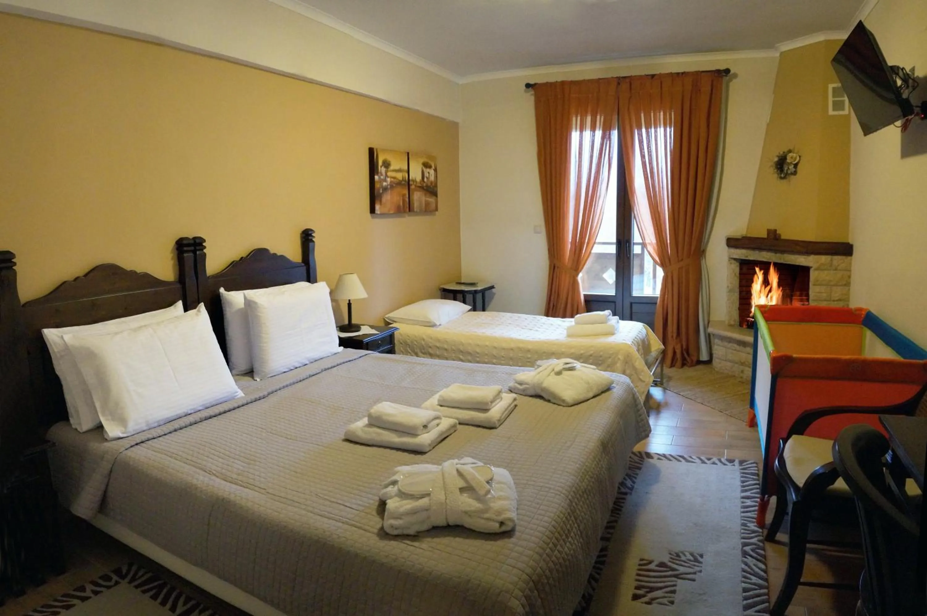 Photo of the whole room, Bed in Melegos Inn Hotel