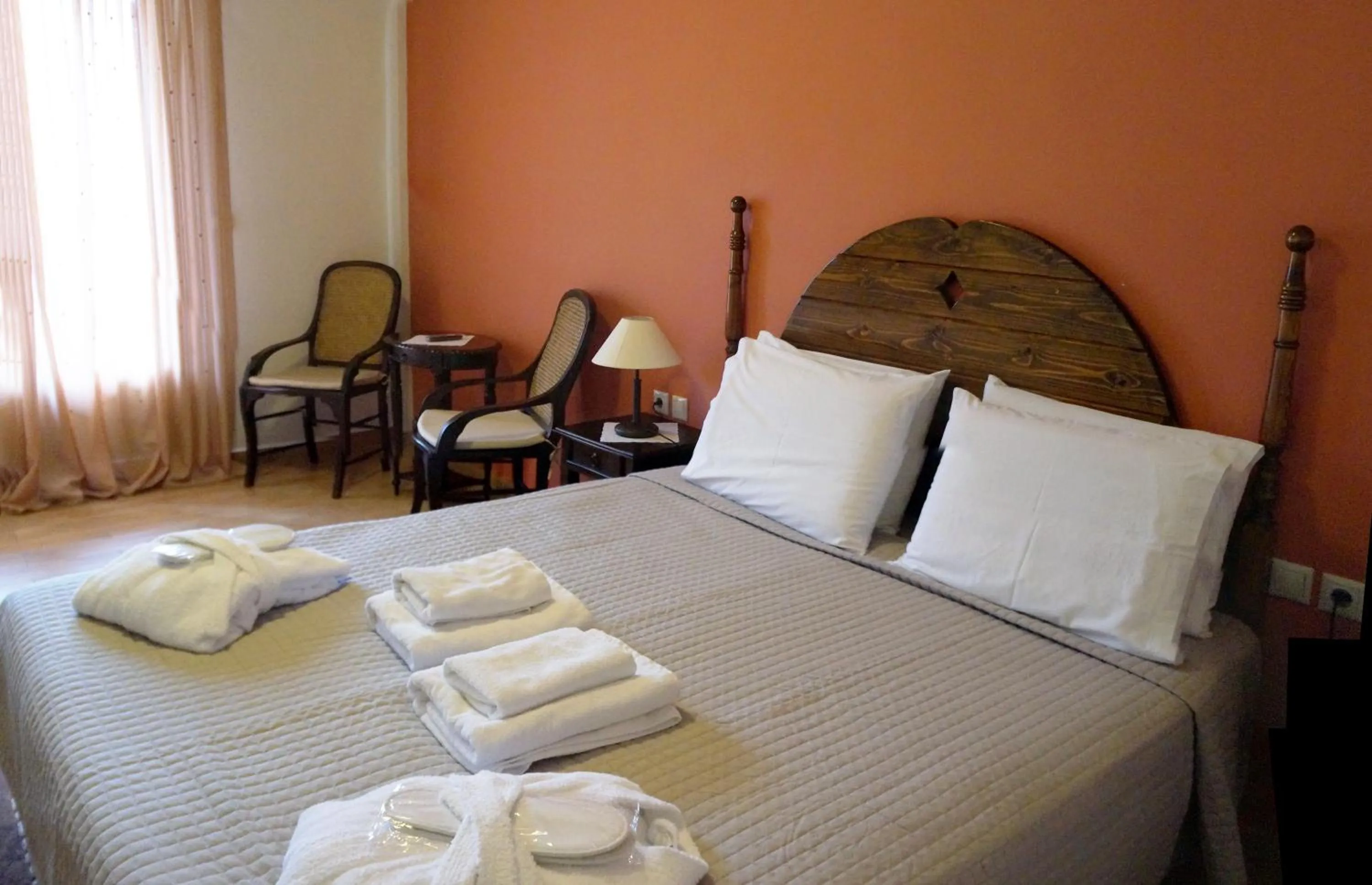 Photo of the whole room, Bed in Melegos Inn Hotel