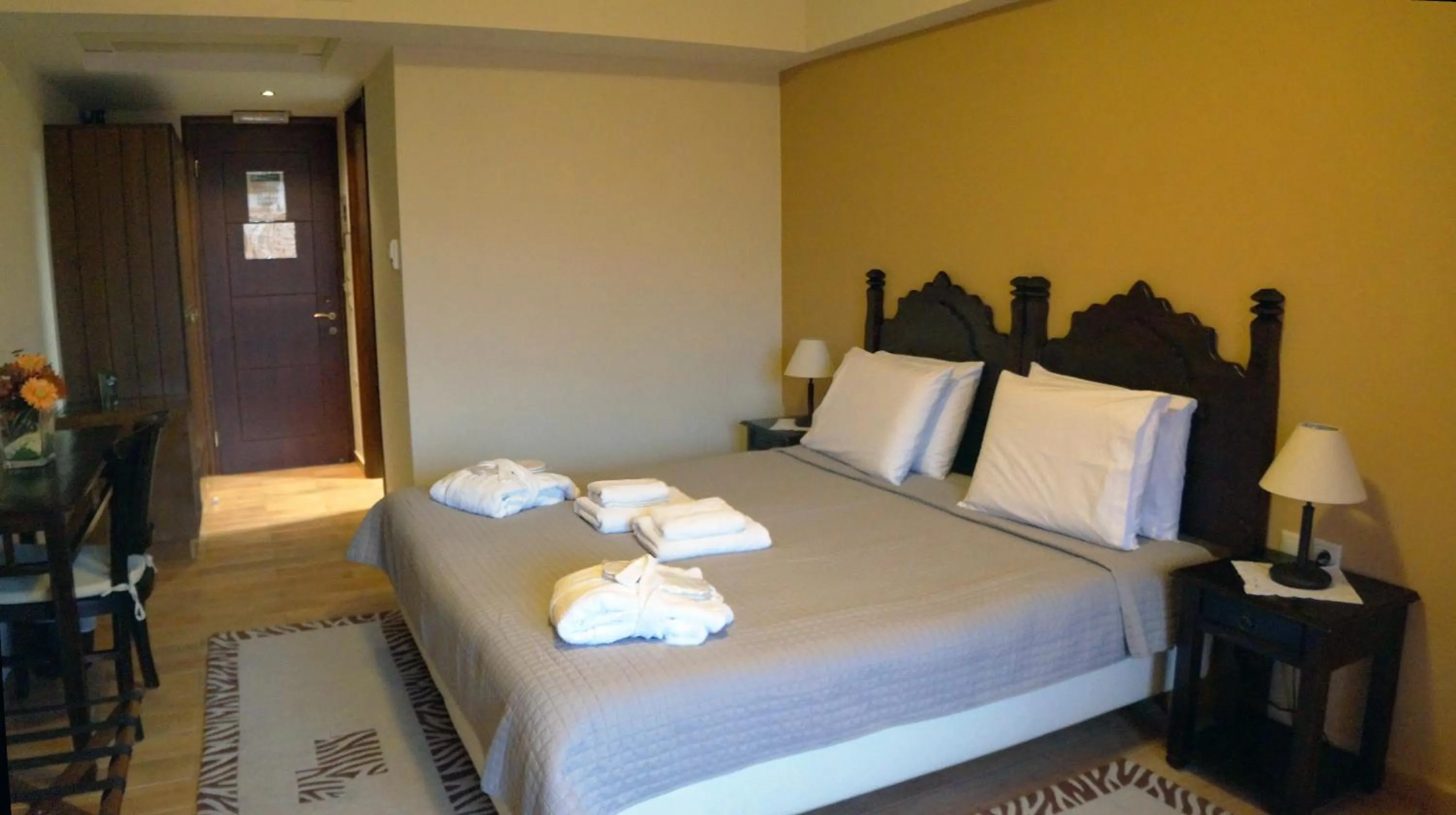 Photo of the whole room, Bed in Melegos Inn Hotel