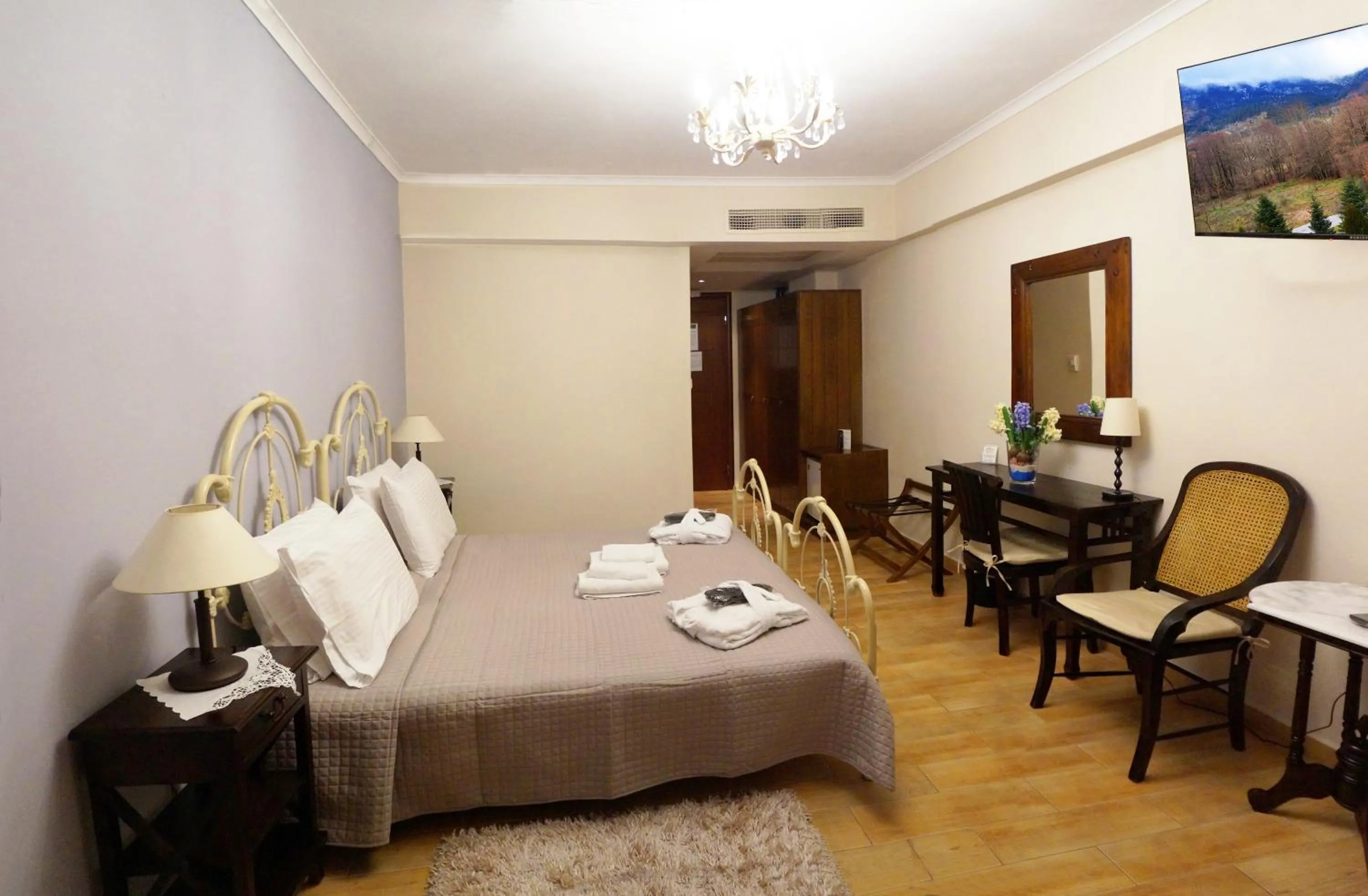 Bed in Melegos Inn Hotel