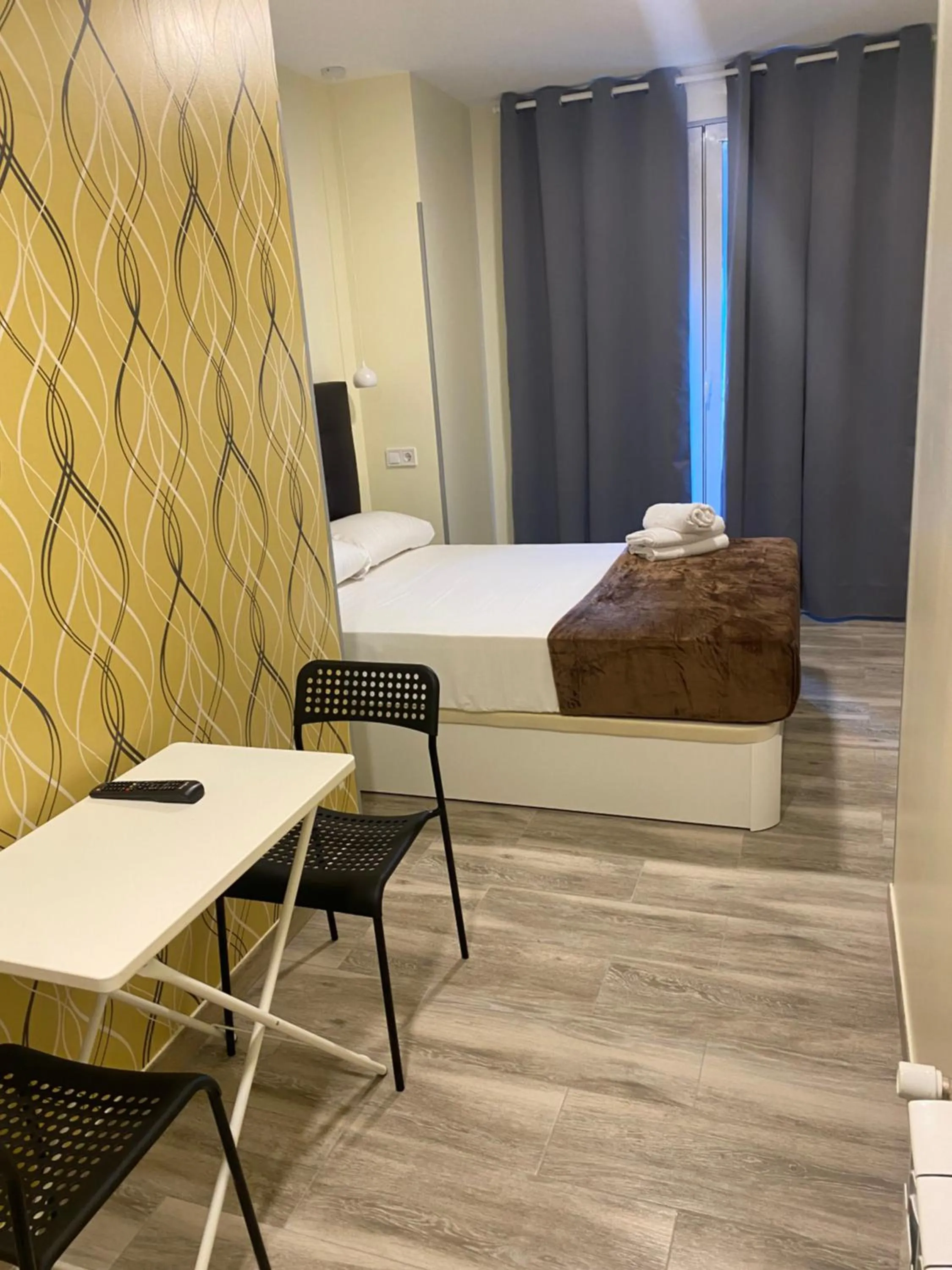 Bed in Hostal Alaska