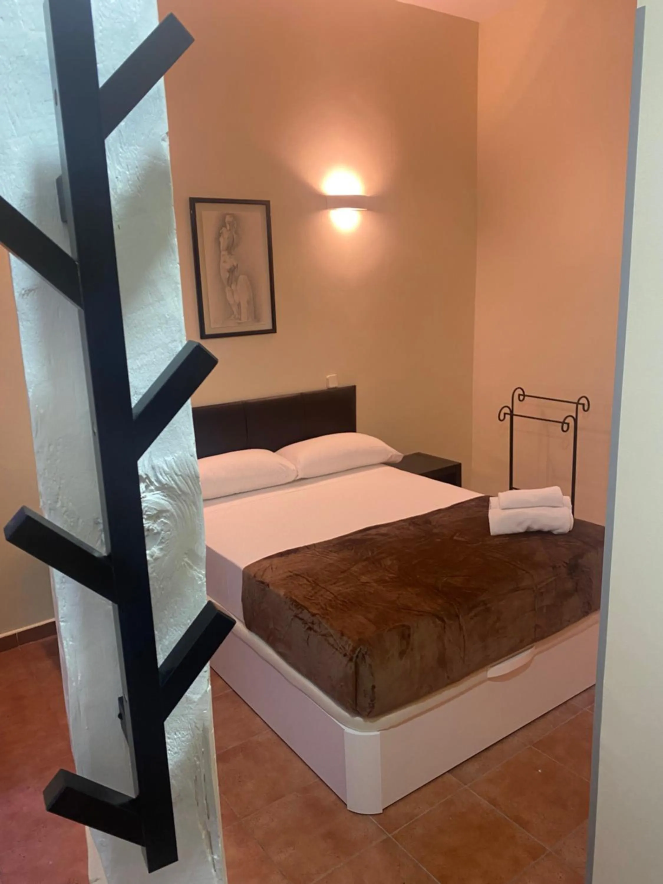 Bed in Hostal Alaska