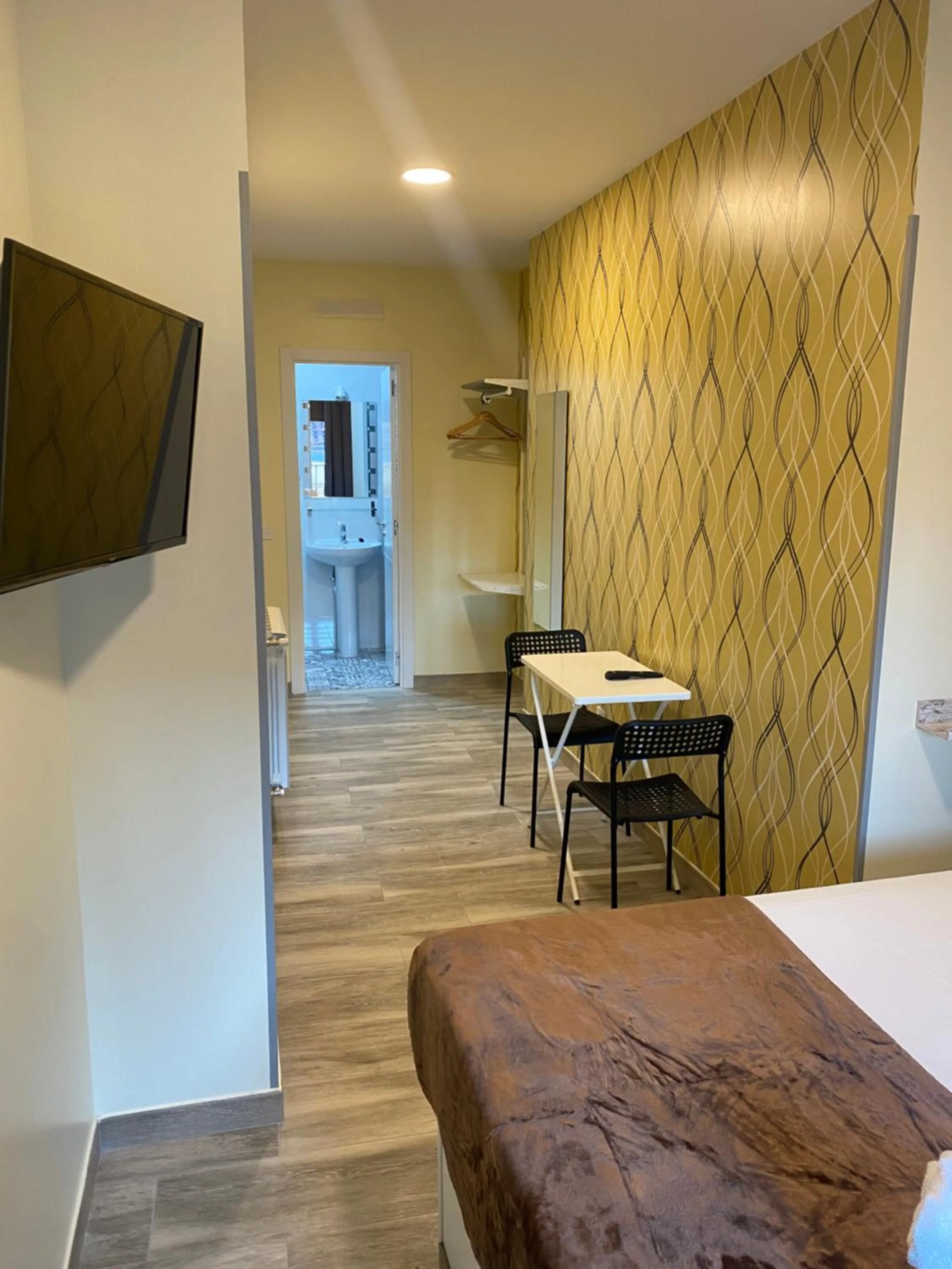 Bed in Hostal Alaska