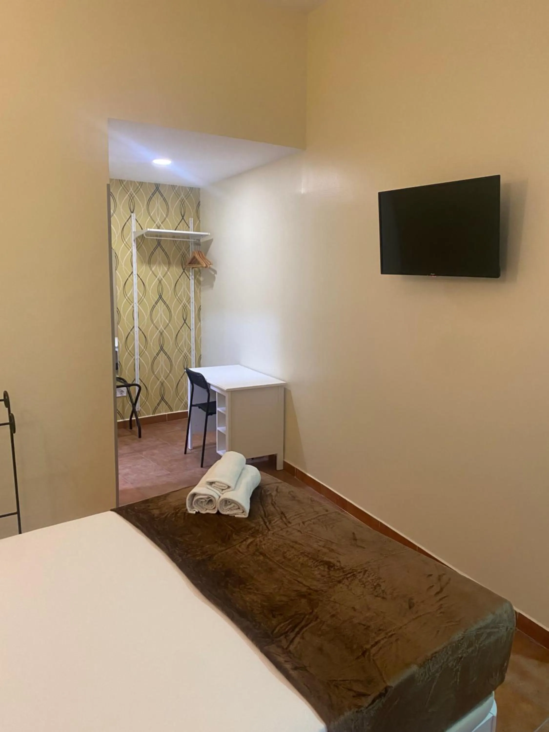 Bed in Hostal Alaska