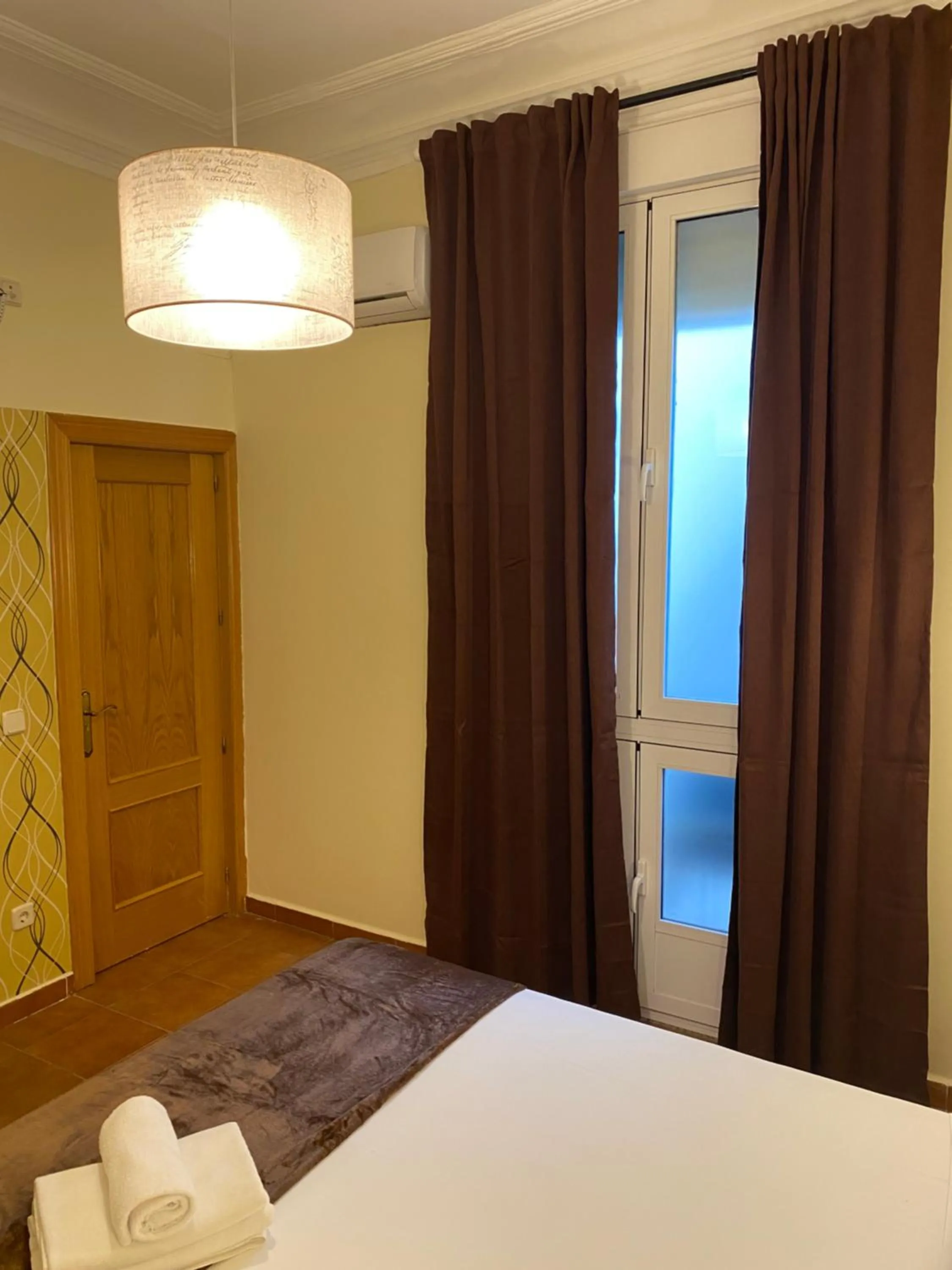 Bed in Hostal Alaska