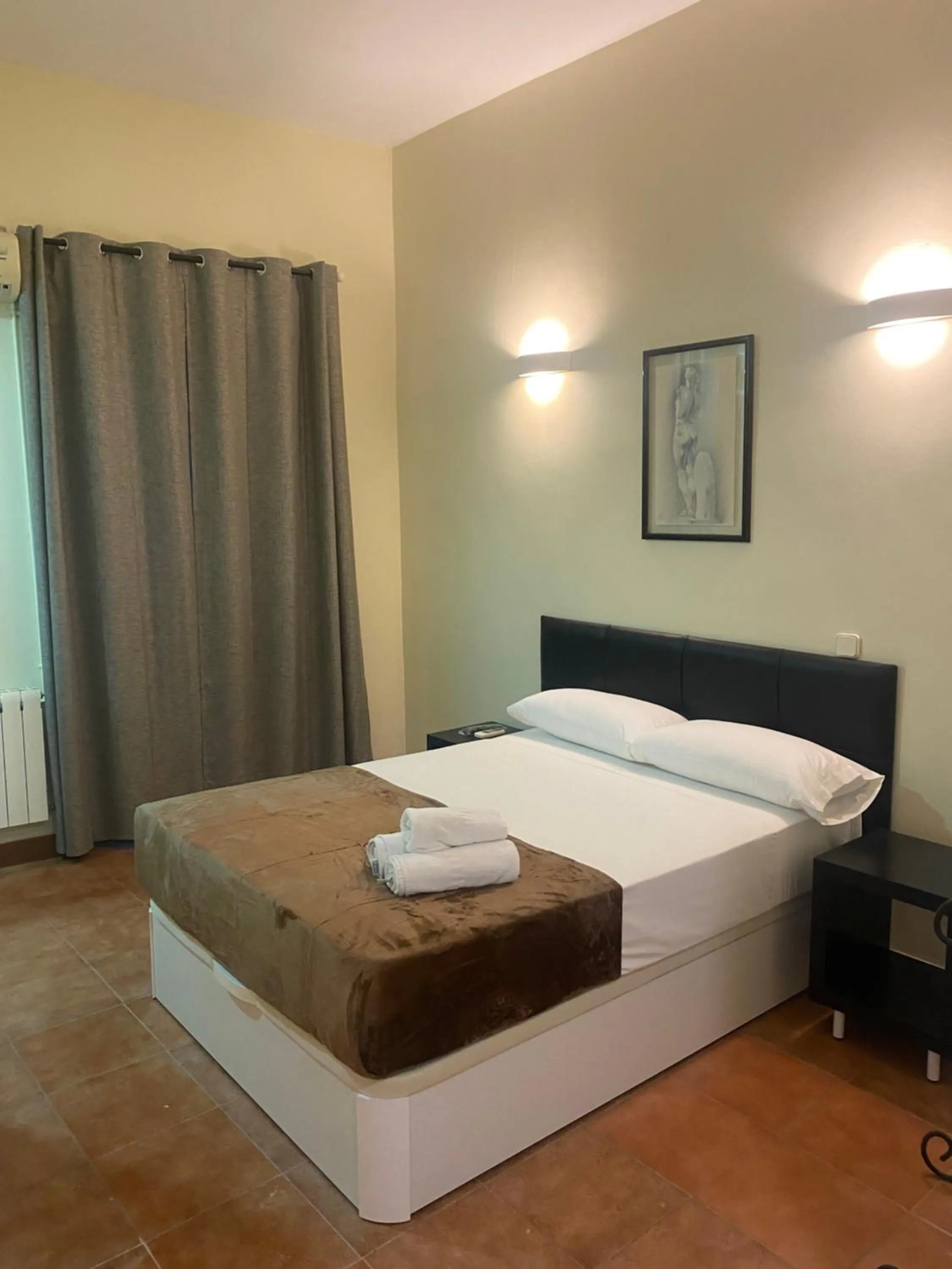 Bed in Hostal Alaska