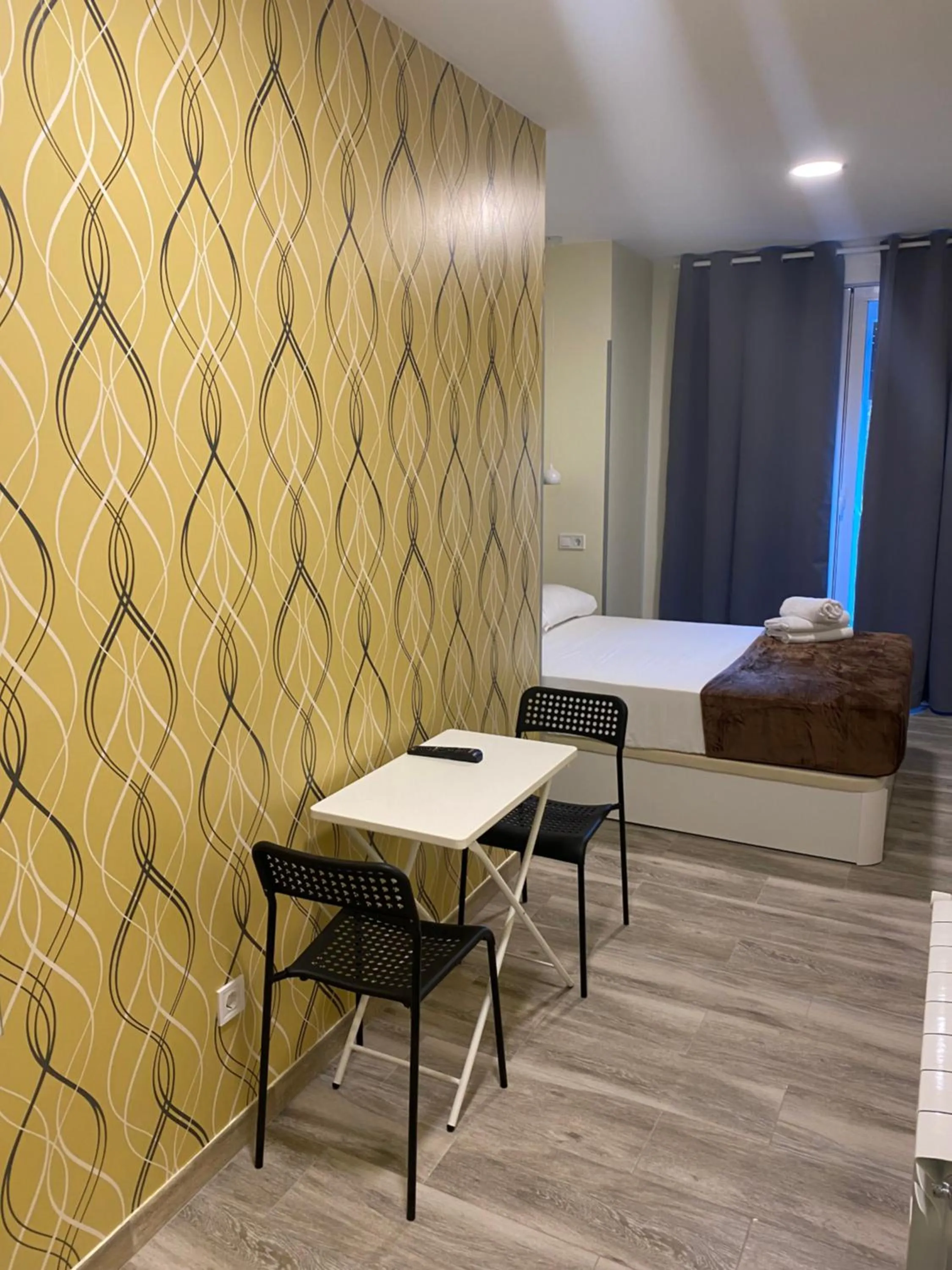 Bed in Hostal Alaska