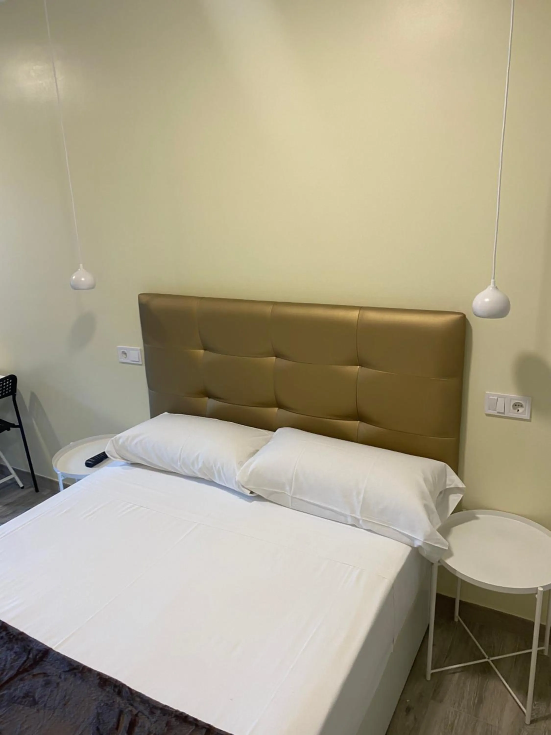 Bed in Hostal Alaska