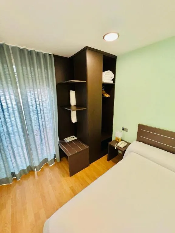 Bed in Hotel Clopy Rocamar