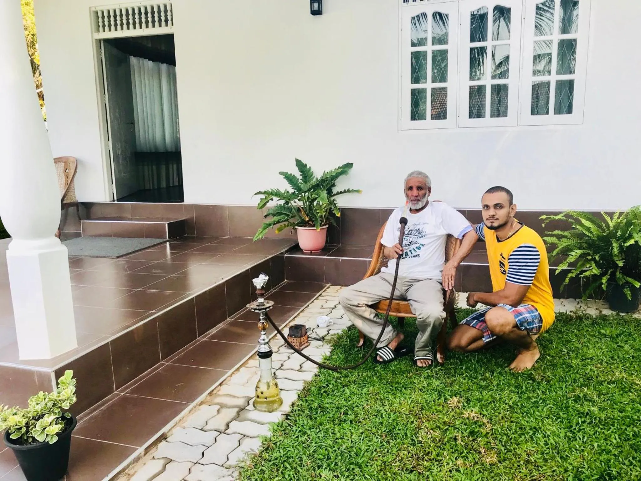 People in White Villa Airport Transit Hotel
