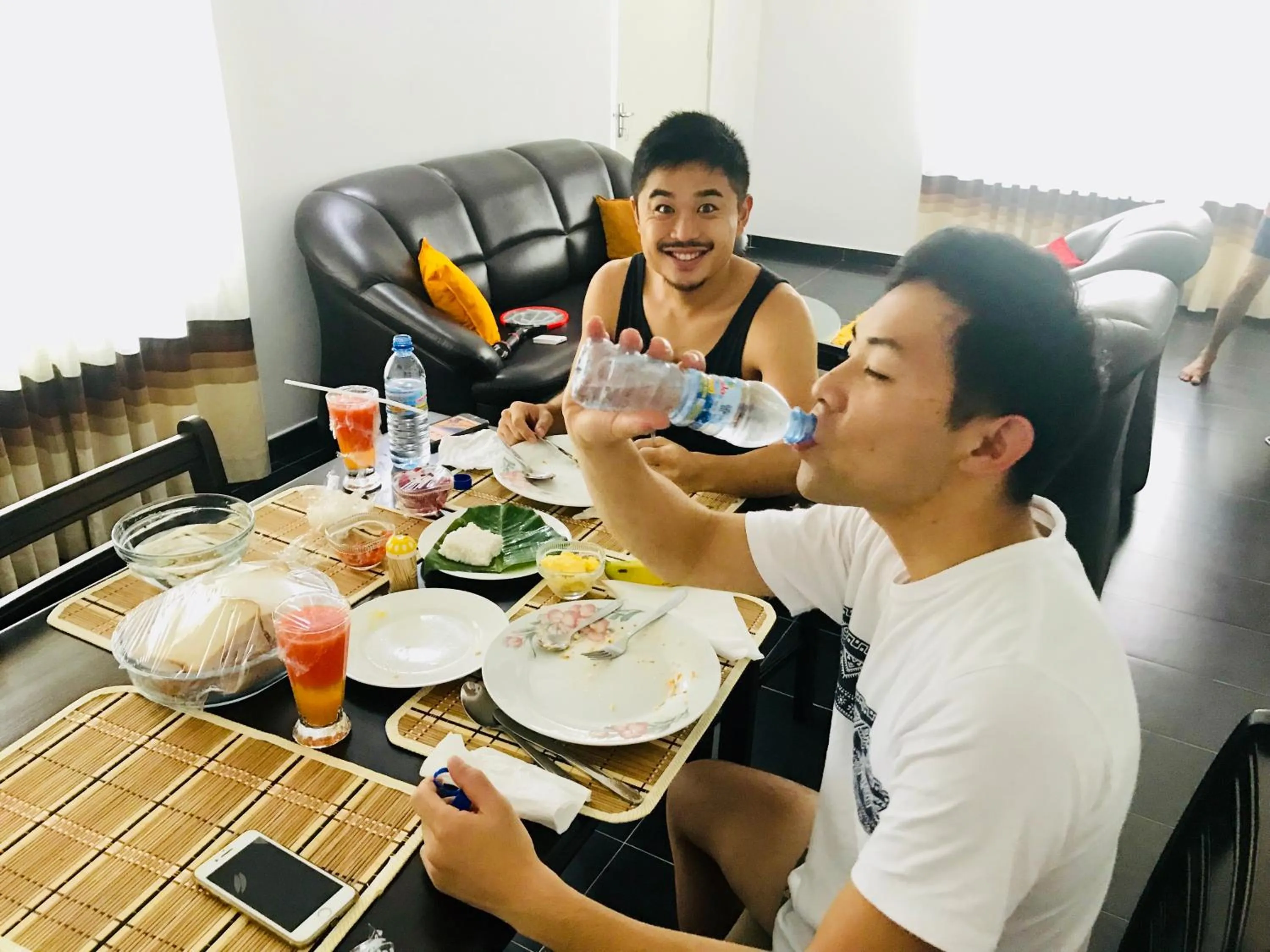 People in White Villa Airport Transit Hotel