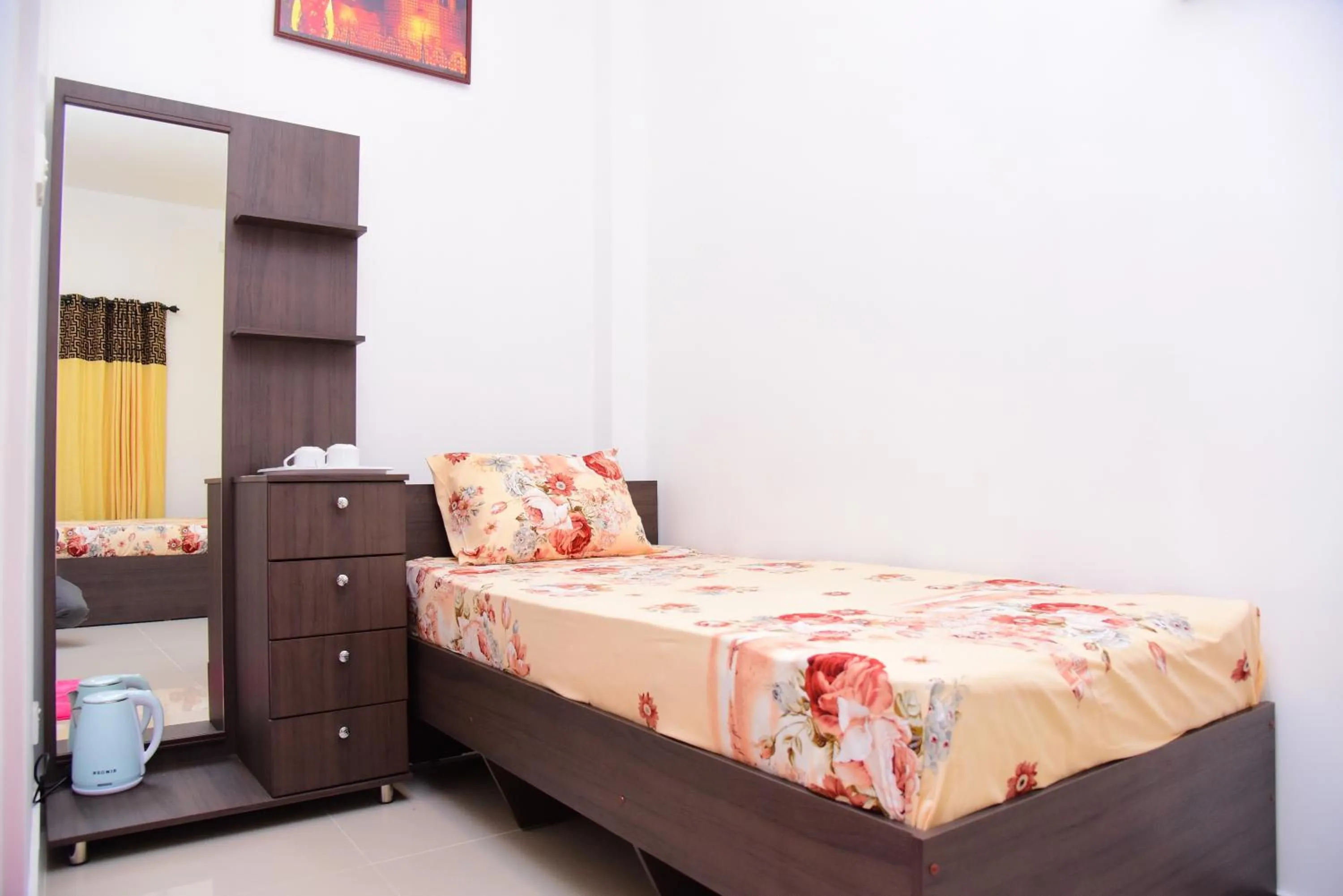 Bed in White Villa Airport Transit Hotel