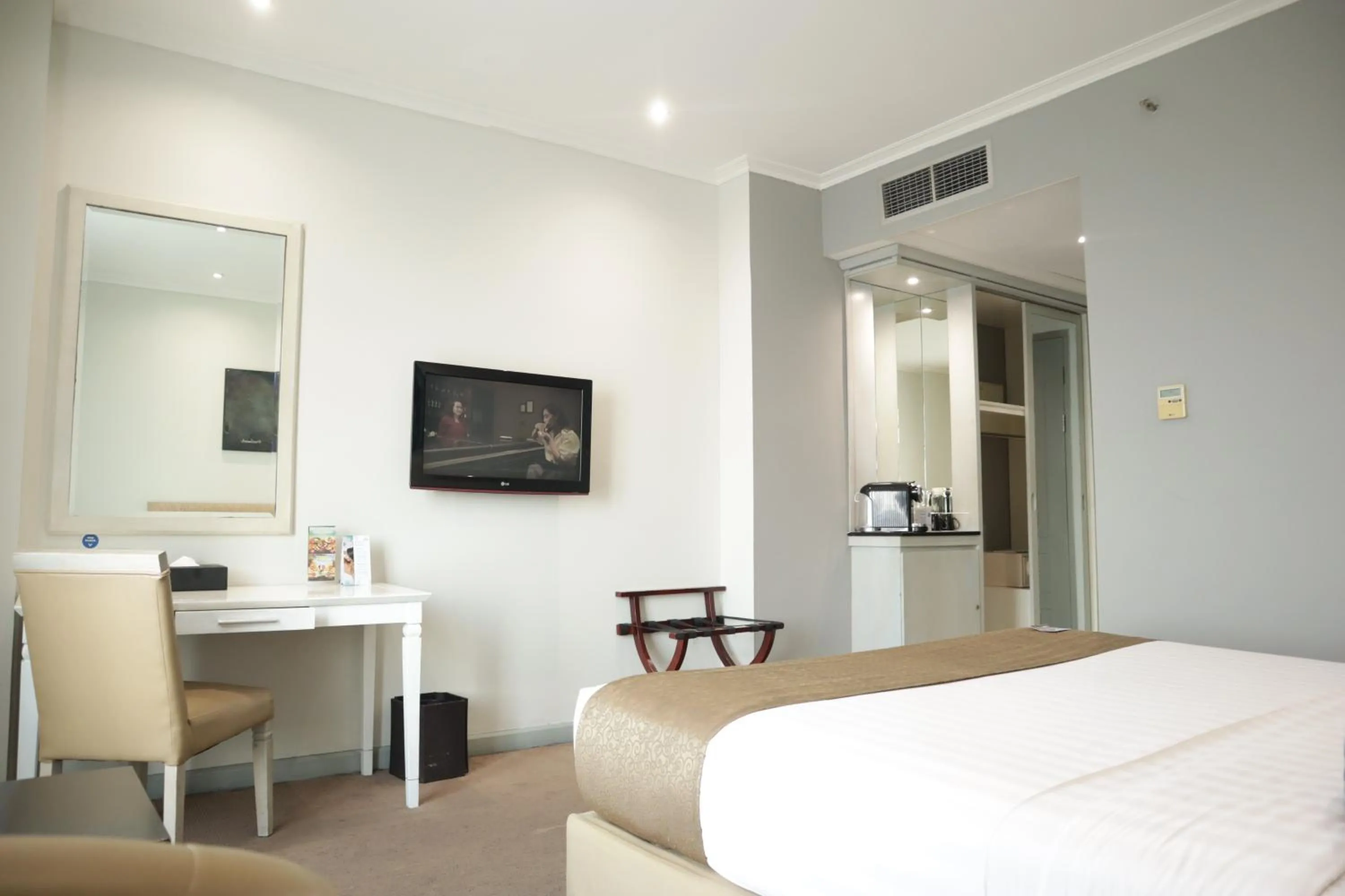 Bed in Hotel Dafam Semarang