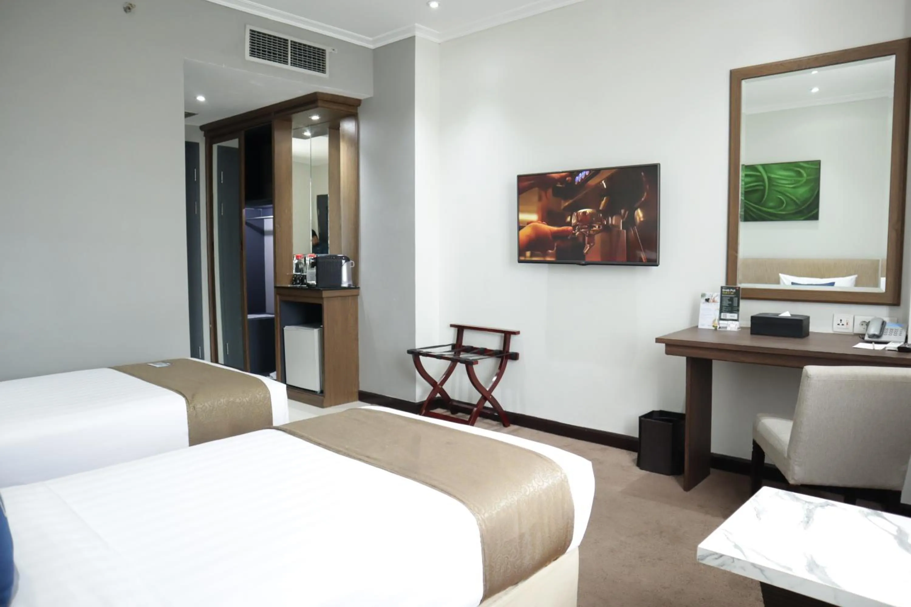 Bed in Hotel Dafam Semarang