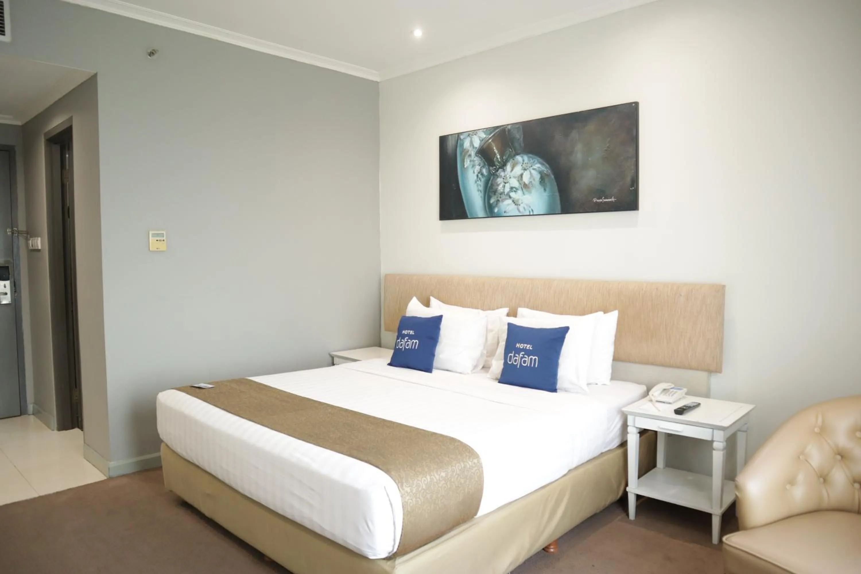 Bed in Hotel Dafam Semarang