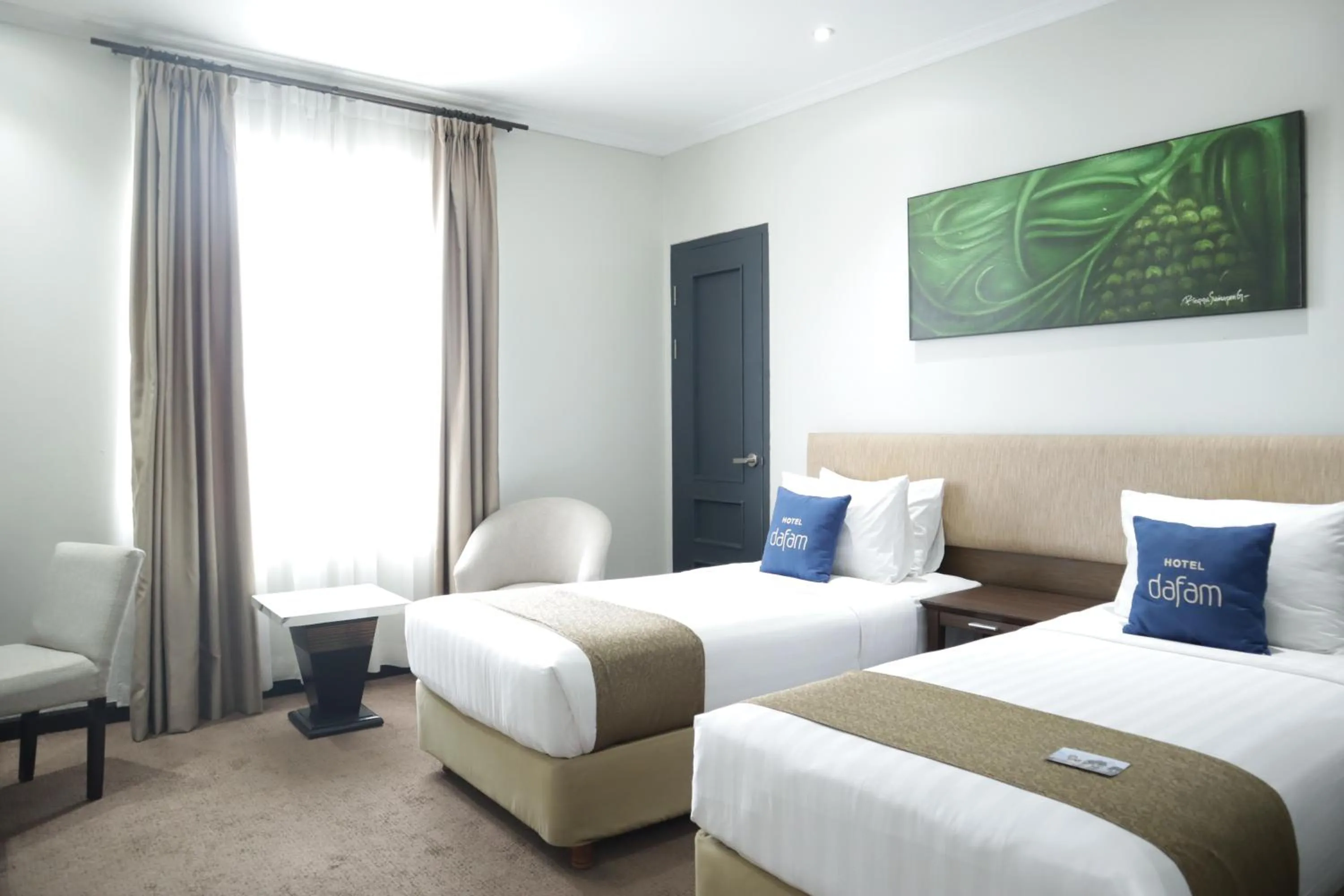 Bed in Hotel Dafam Semarang