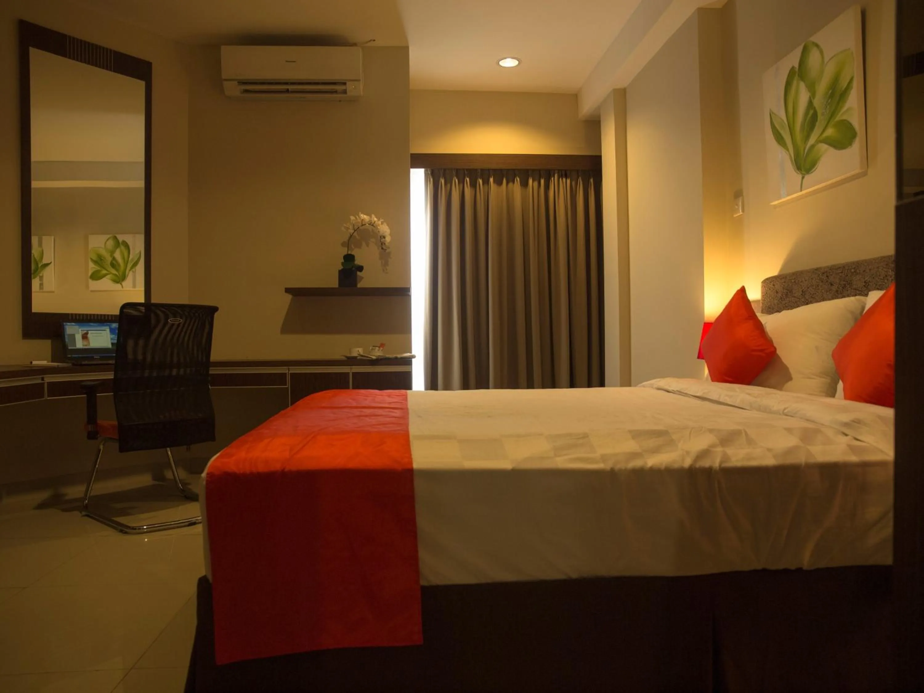 Bed in The Gloria Suites Grogol