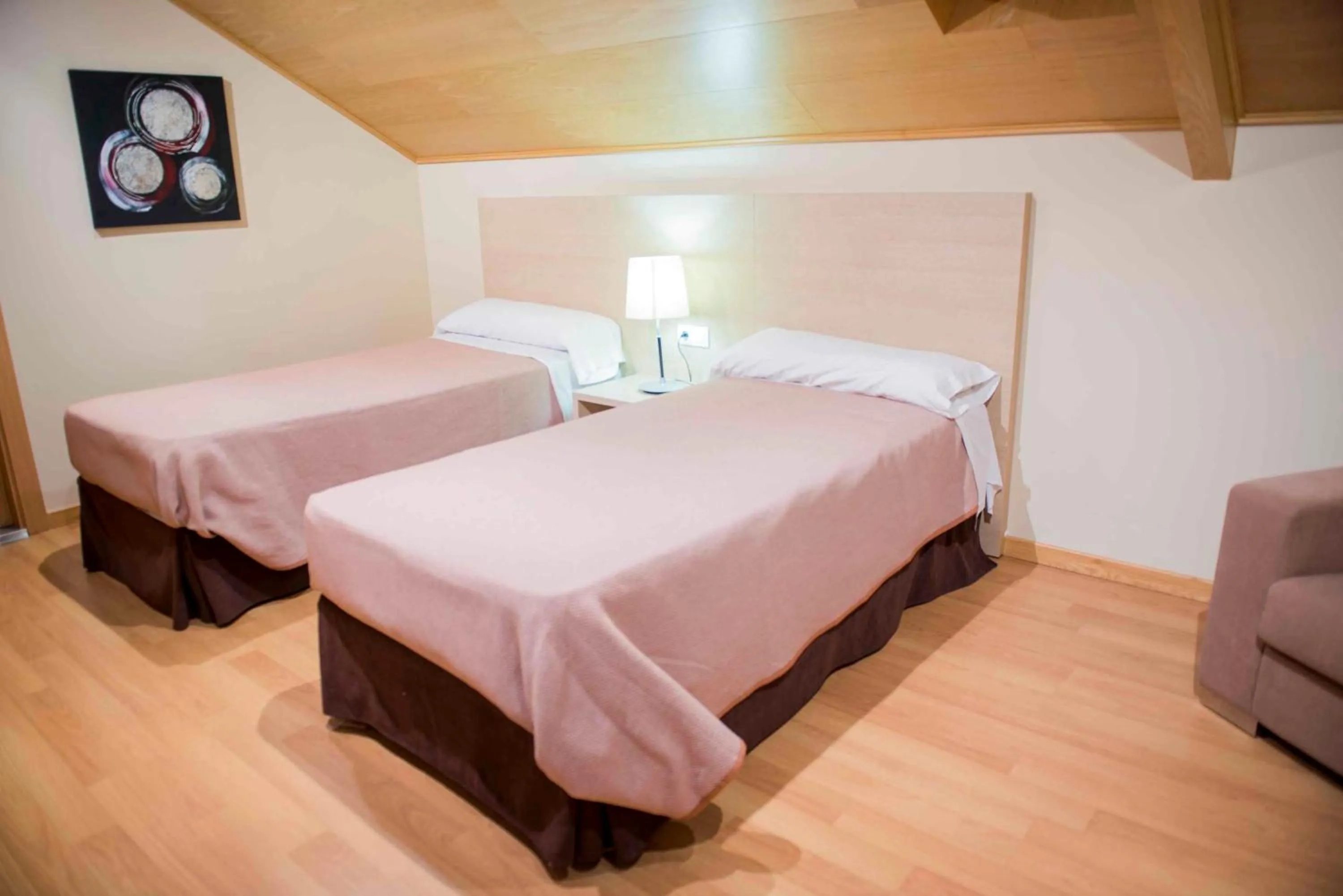 Bed in Hotel Meson de Erosa