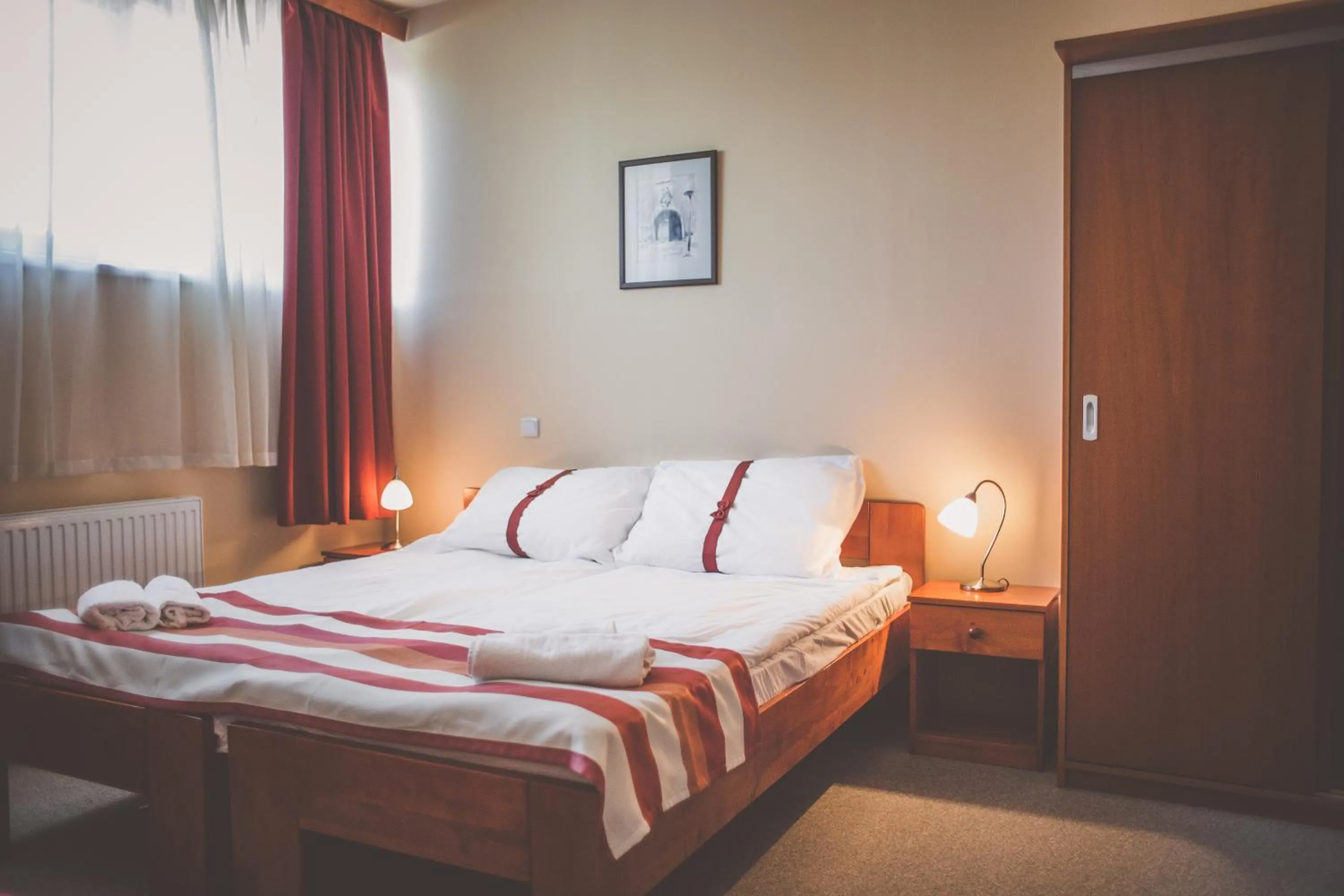 Bed in Fordan Hotel Pécs