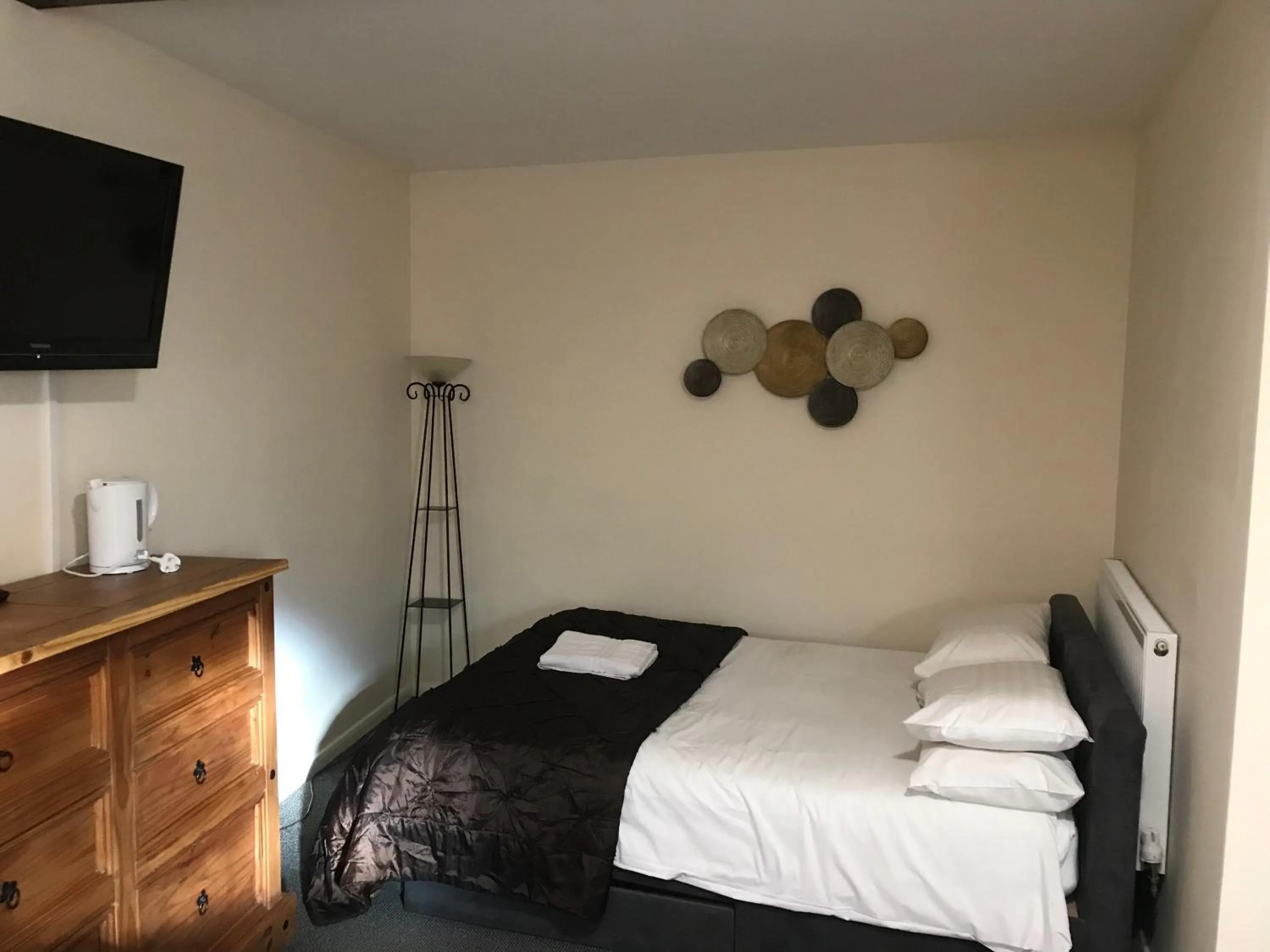 Bed in The Coach House at The Bull Inn