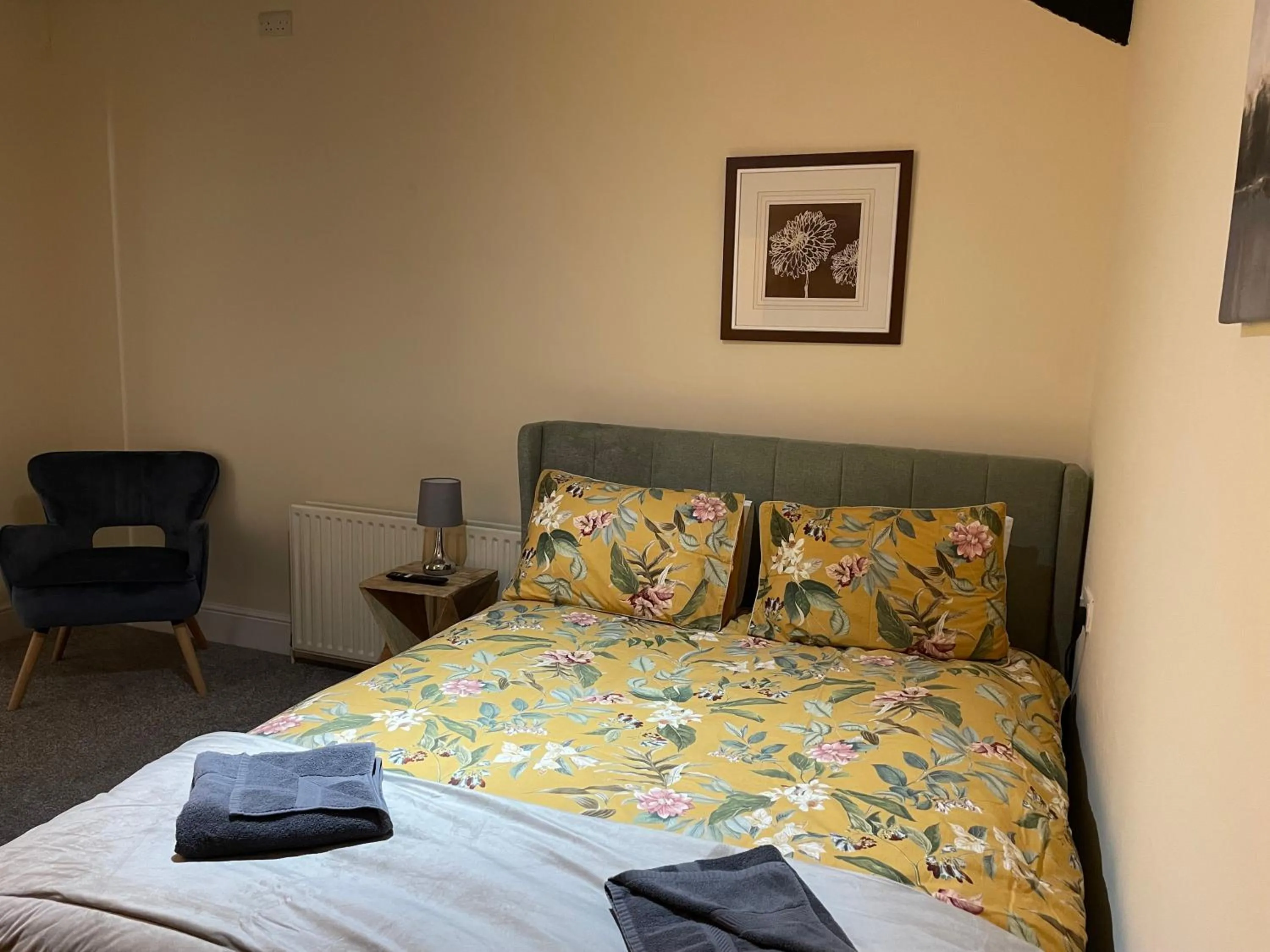 Bed in The Coach House at The Bull Inn