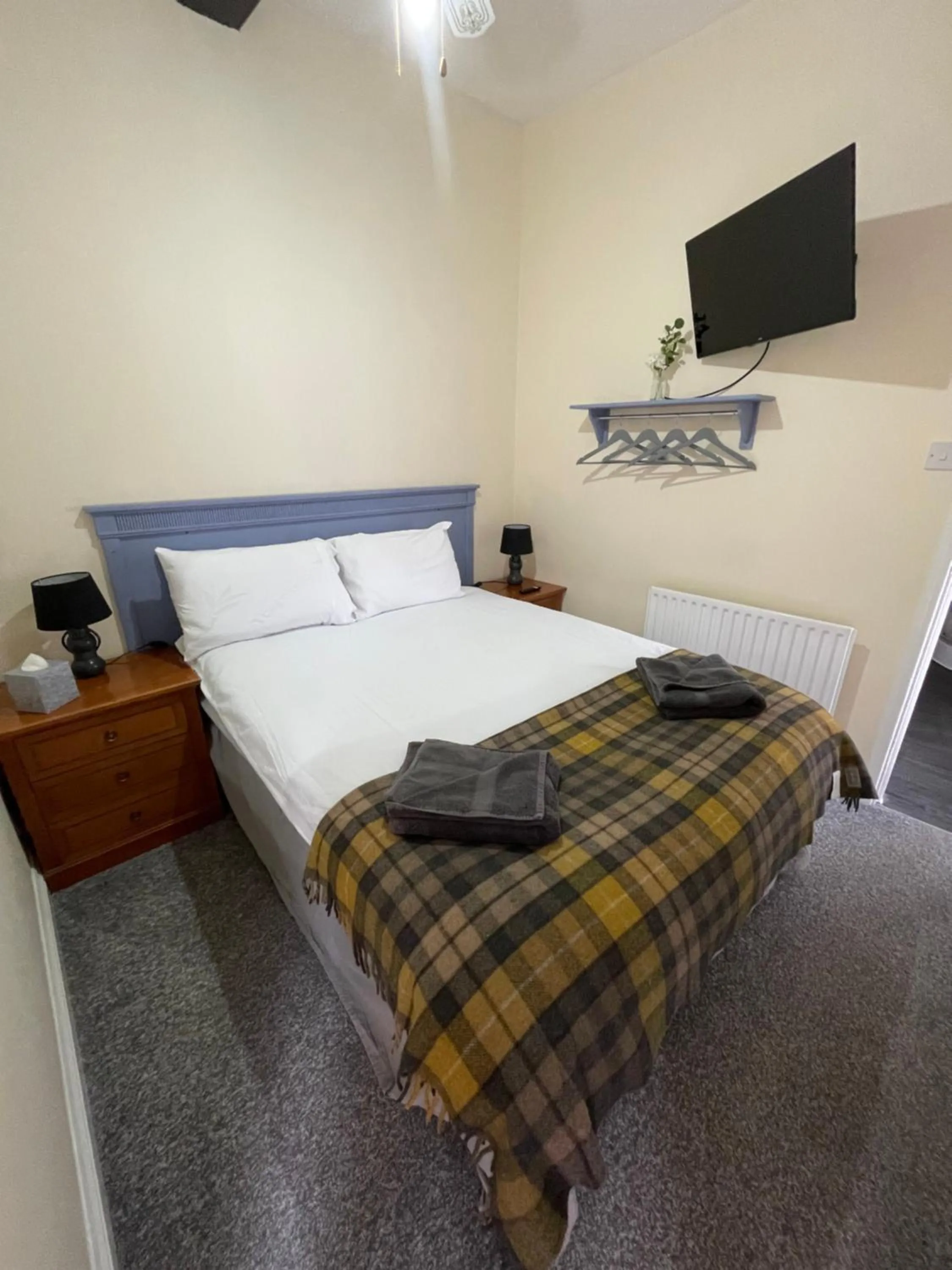 Bed in The Coach House at The Bull Inn