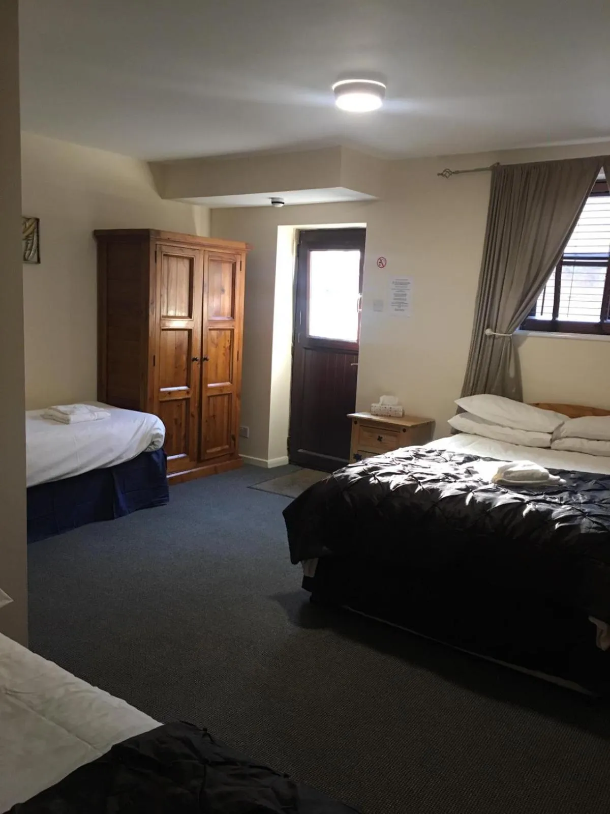 Bed in The Coach House at The Bull Inn