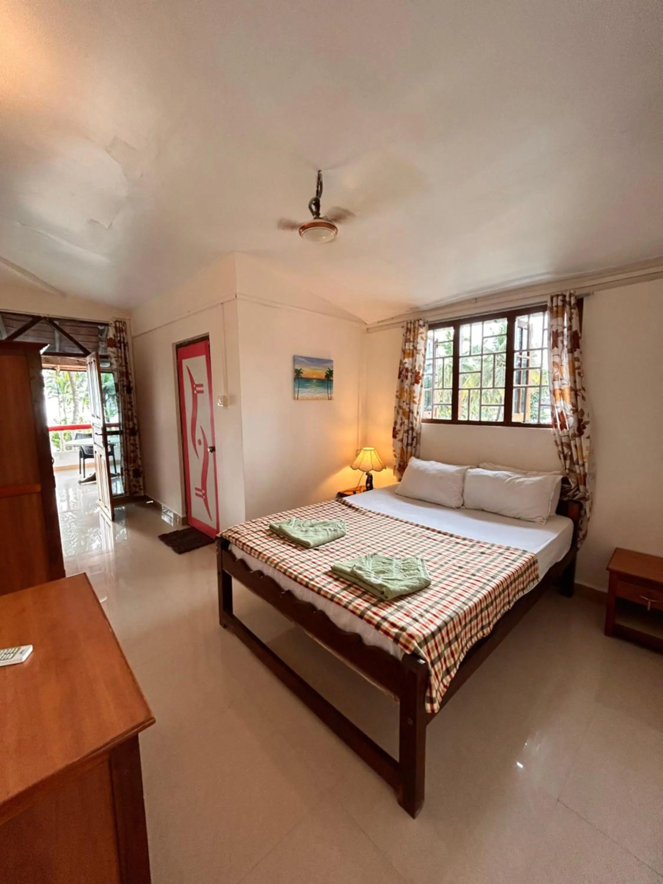 Bed in Maria Paulo Guest House Bar and Restaurant