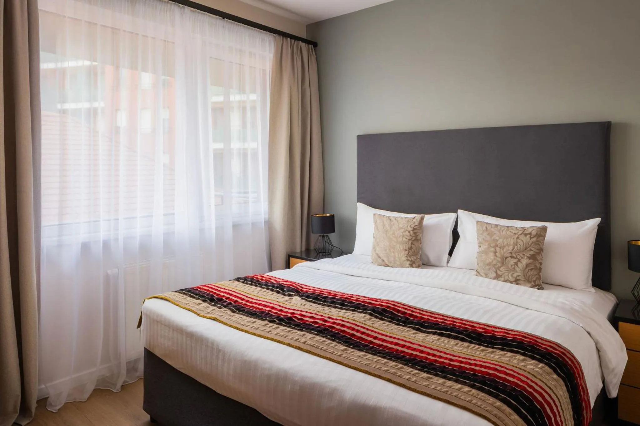 Bed in Escala Hotel & Suites