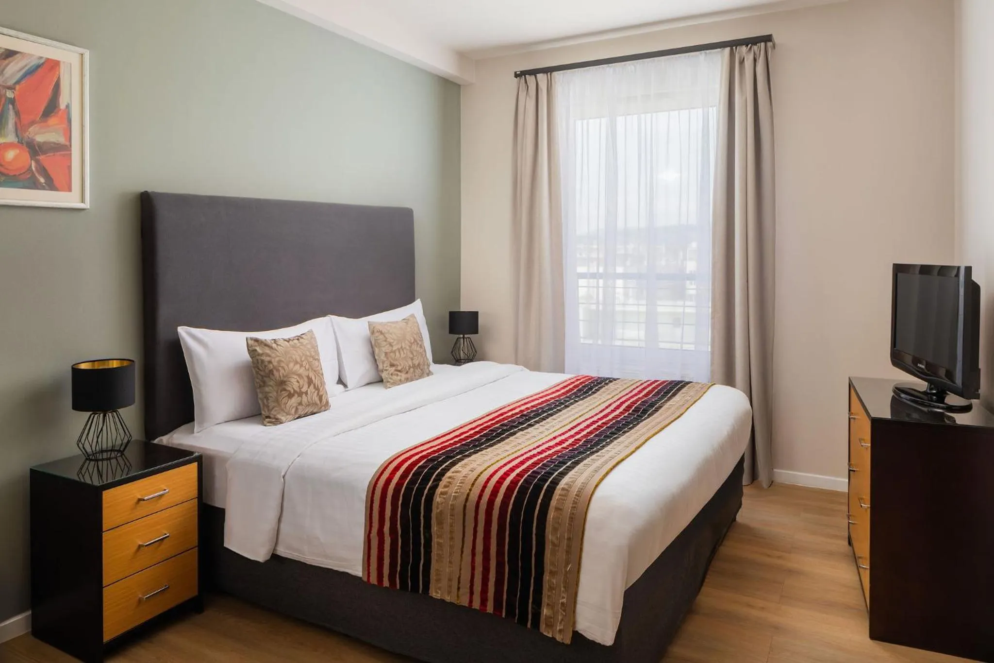 Bed in Escala Hotel & Suites