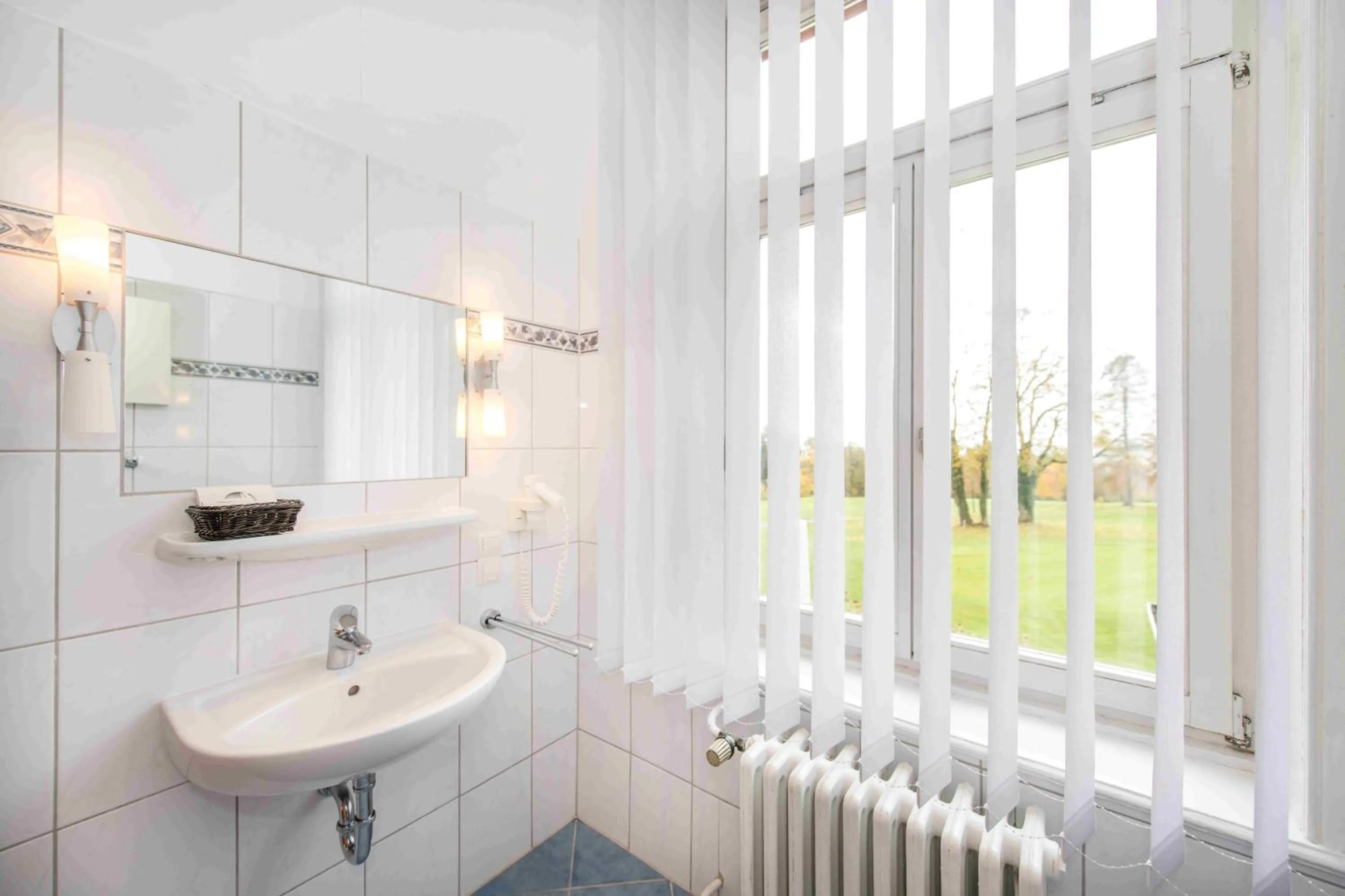 Bathroom in Golfhotel Denzerheide