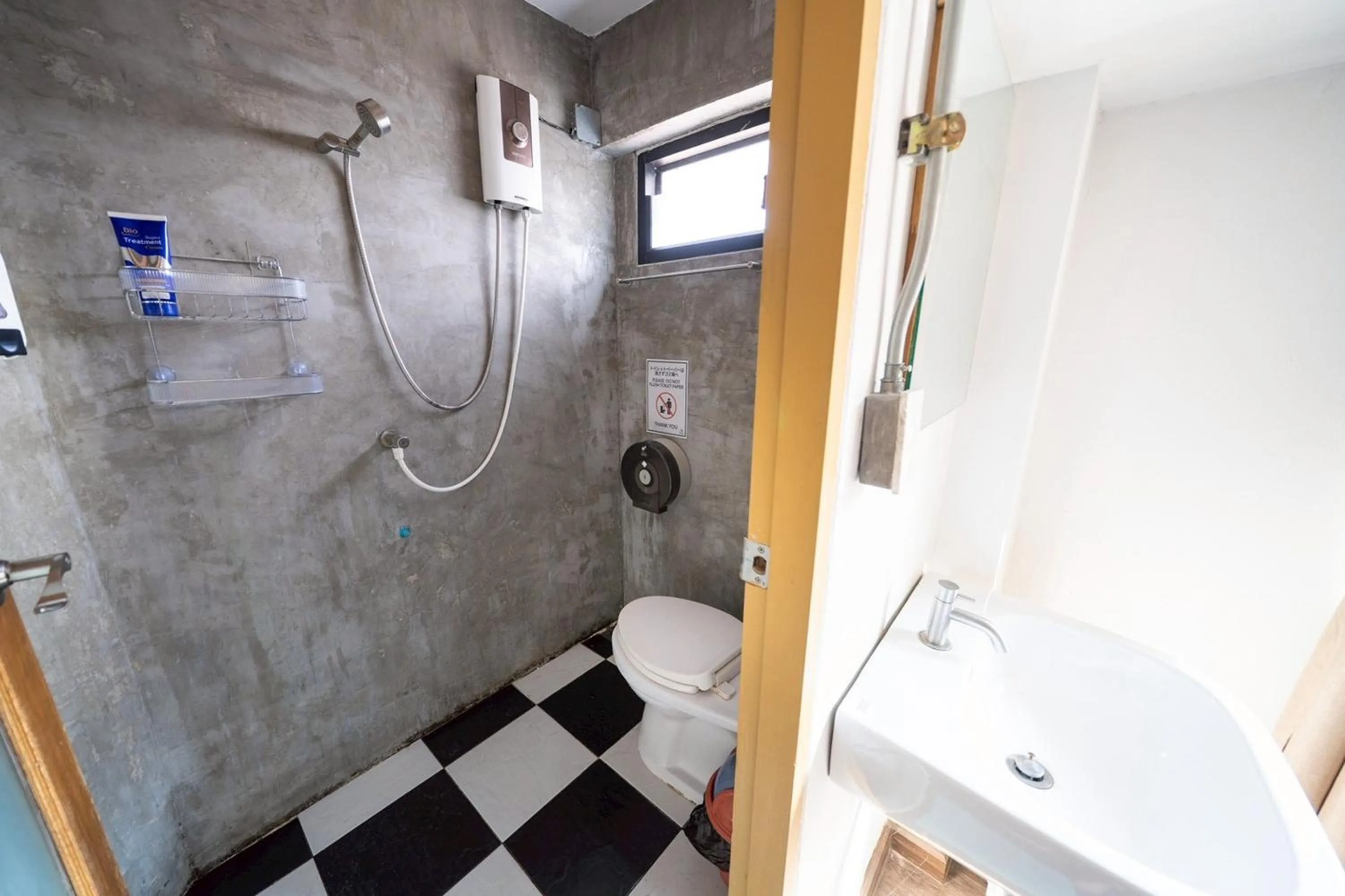 Bathroom in Koenji Guest House & Bar Chiang Mai