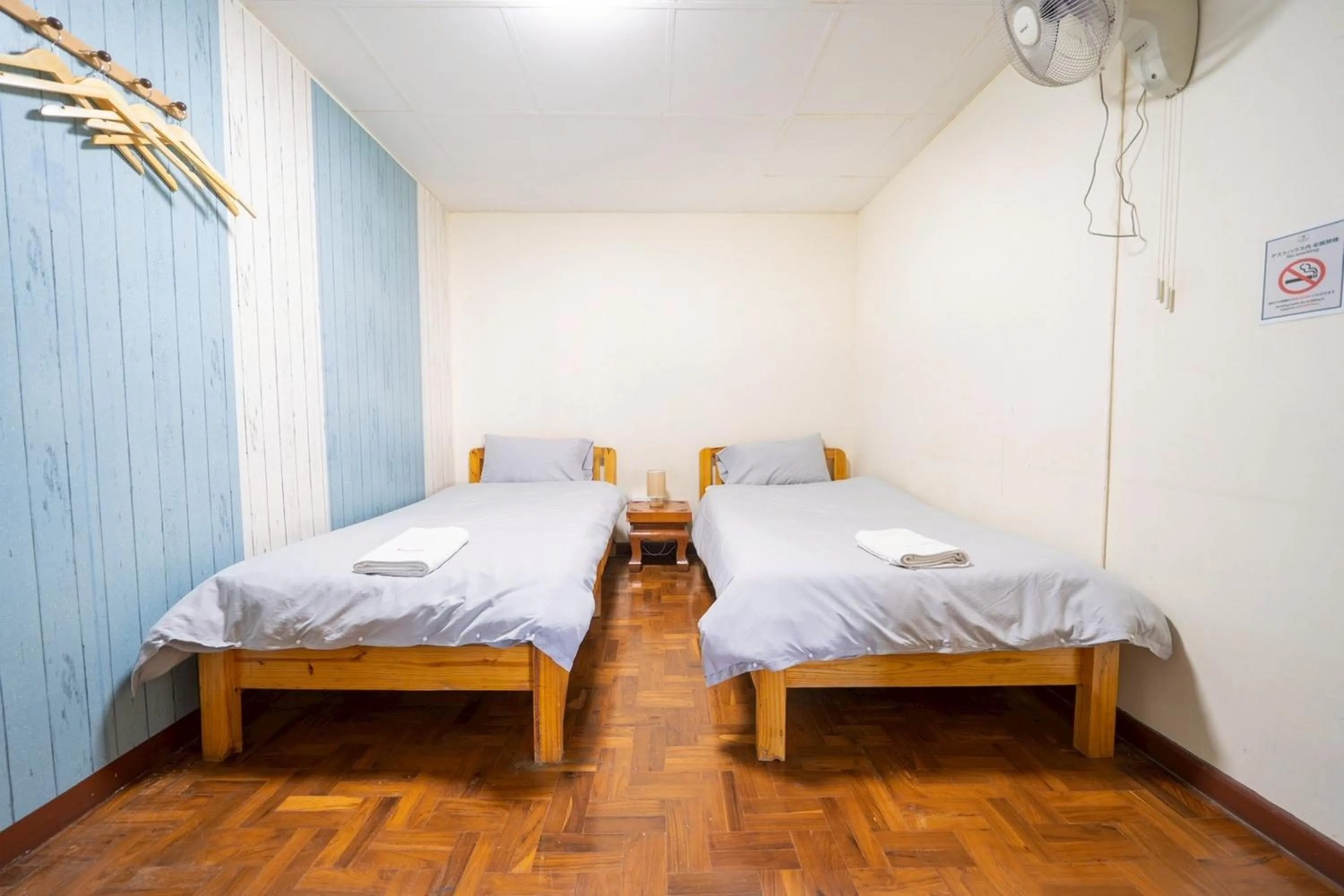 Bed in Koenji Guest House & Bar Chiang Mai