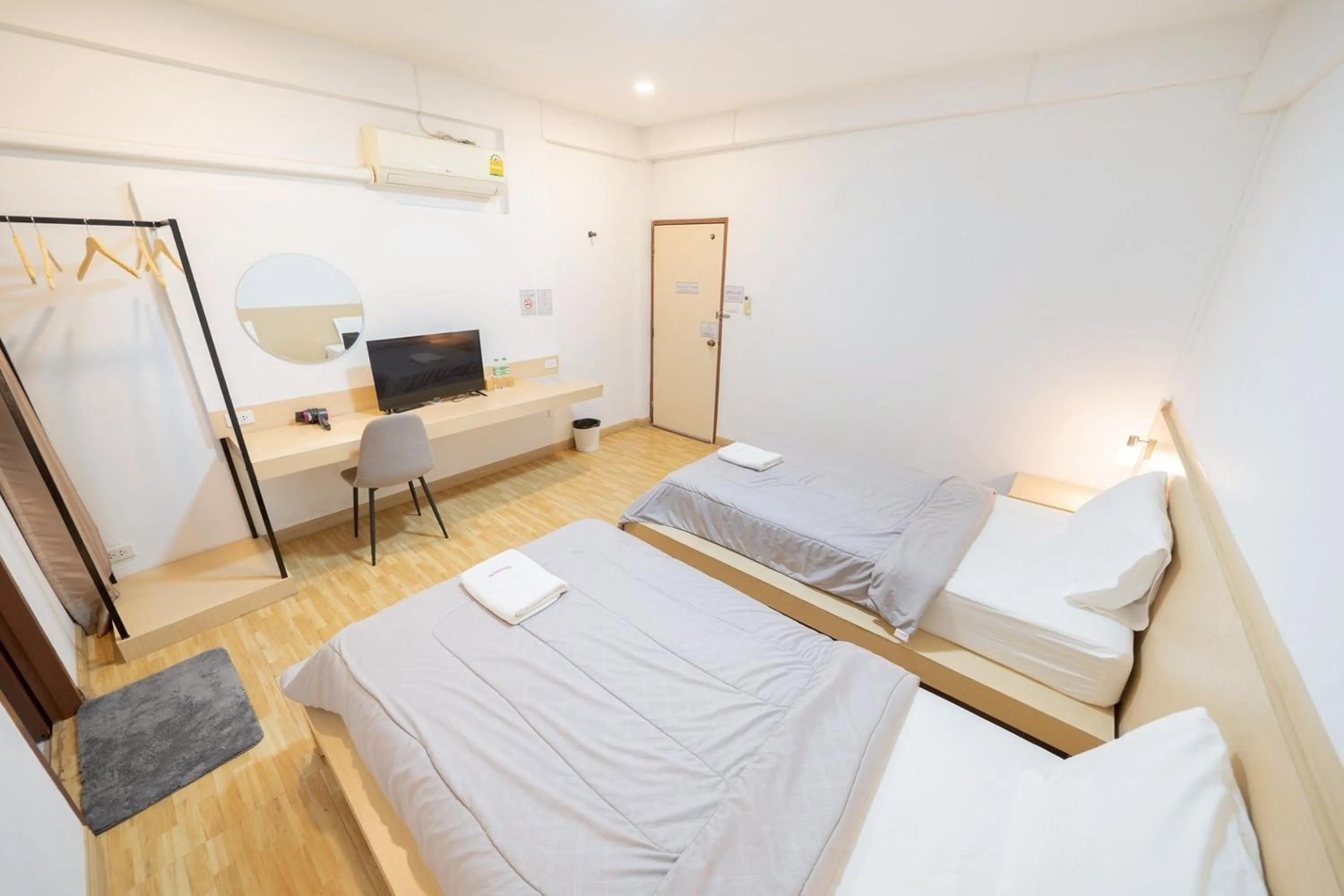 Bed in Koenji Guest House & Bar Chiang Mai