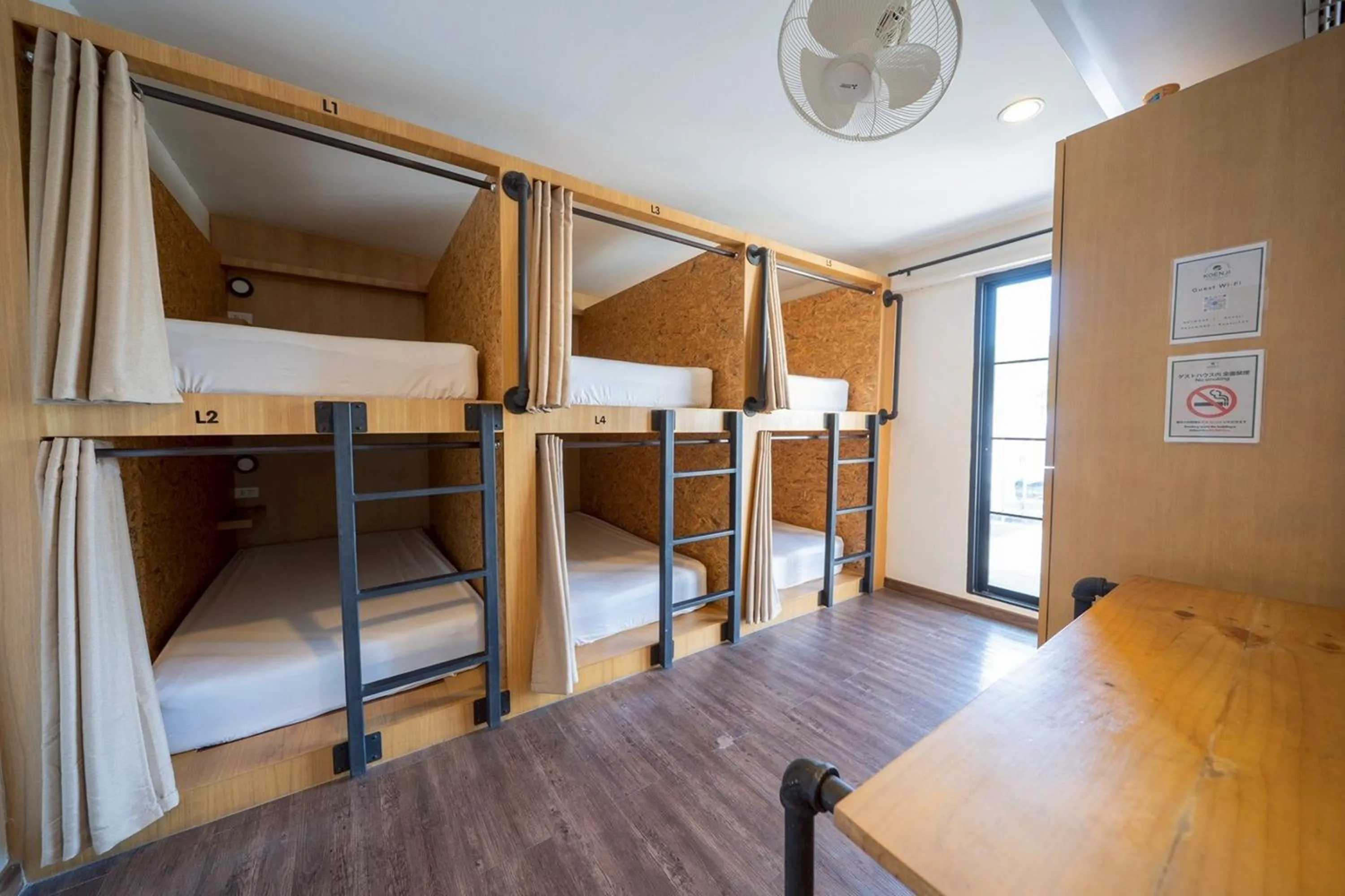 Bed in Koenji Guest House & Bar Chiang Mai