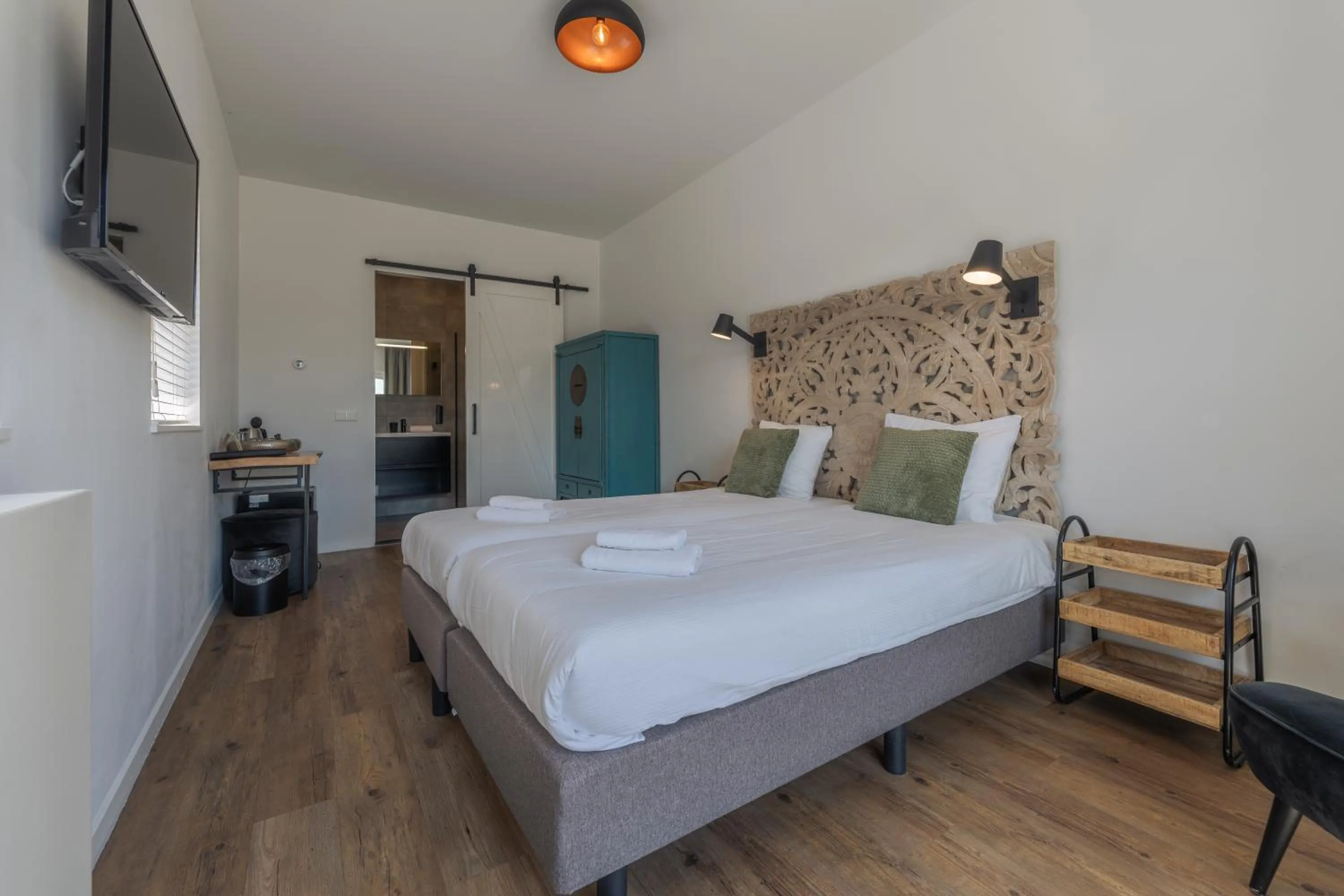 Bed in Strandhotel Dennenbos