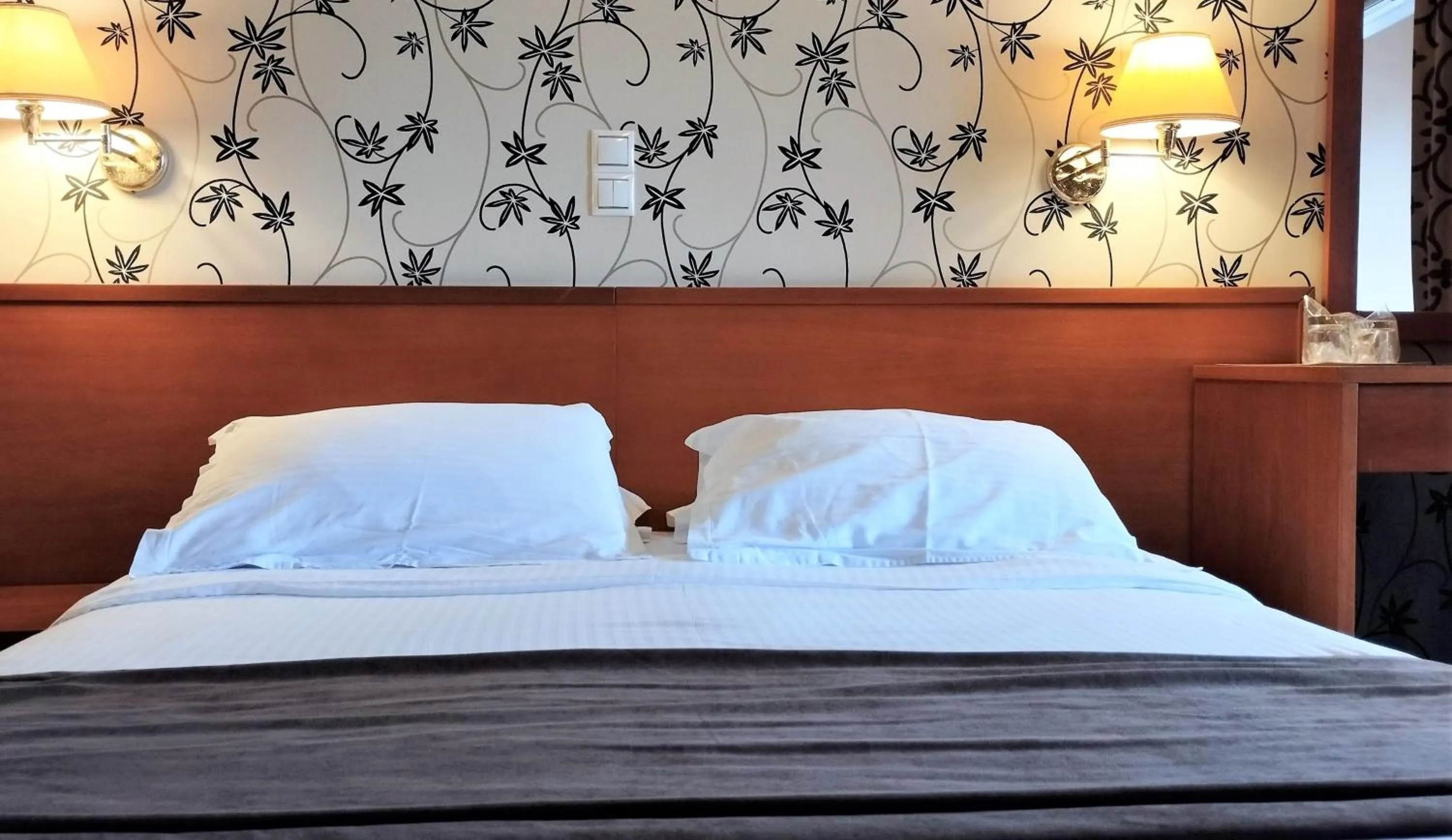 Bed in Palatino Hotel