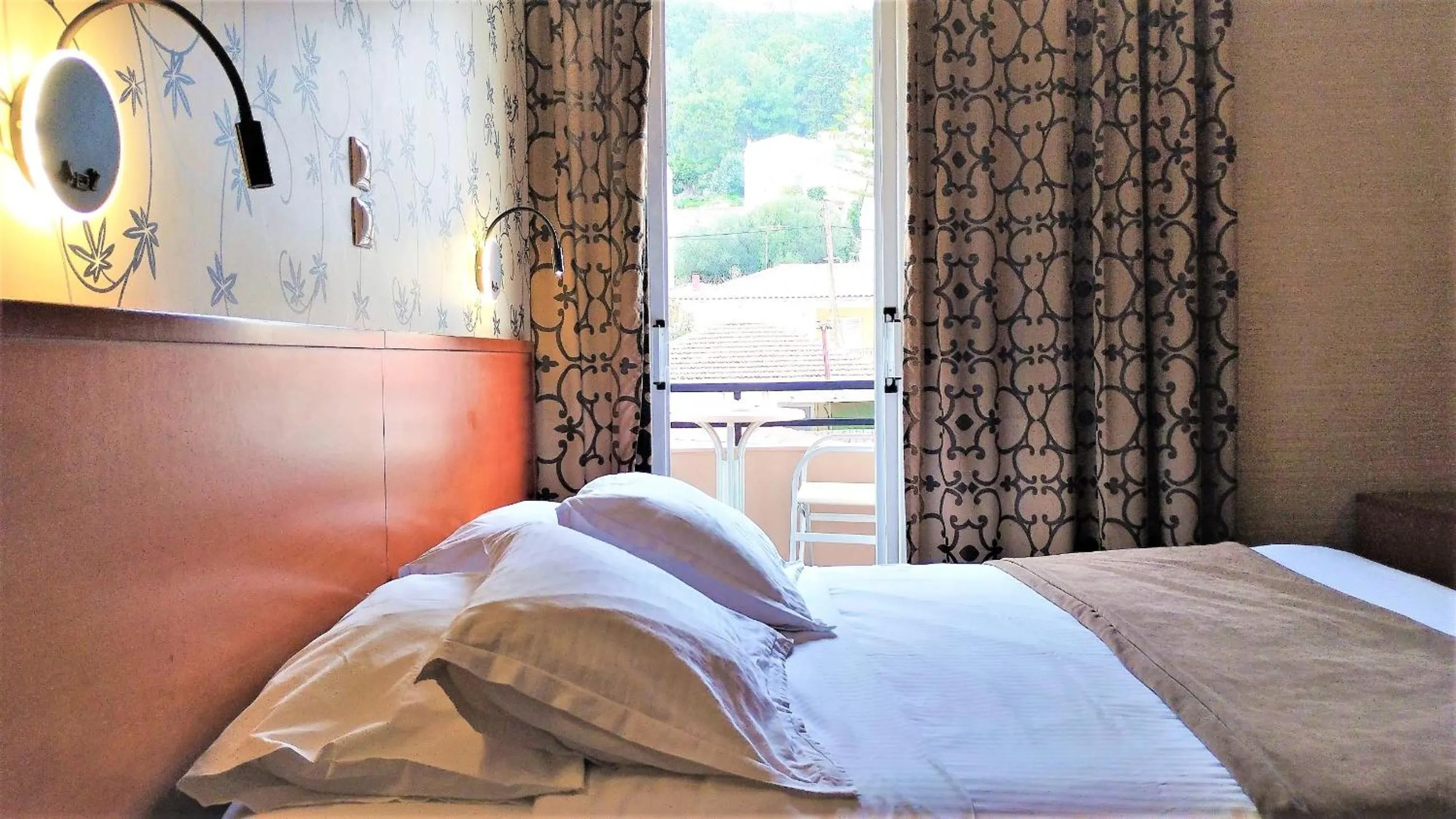 Bed in Palatino Hotel