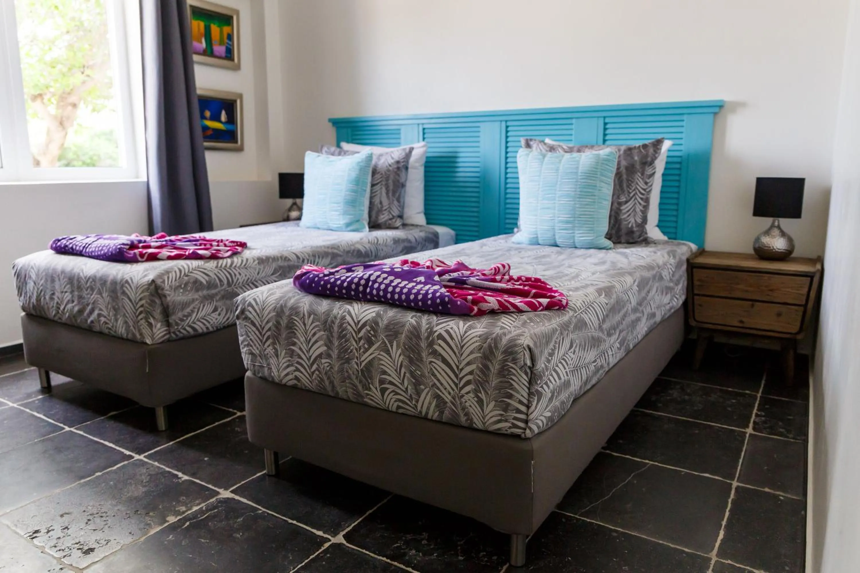 Bed in Aruba Boutique Apartments - Adults Only