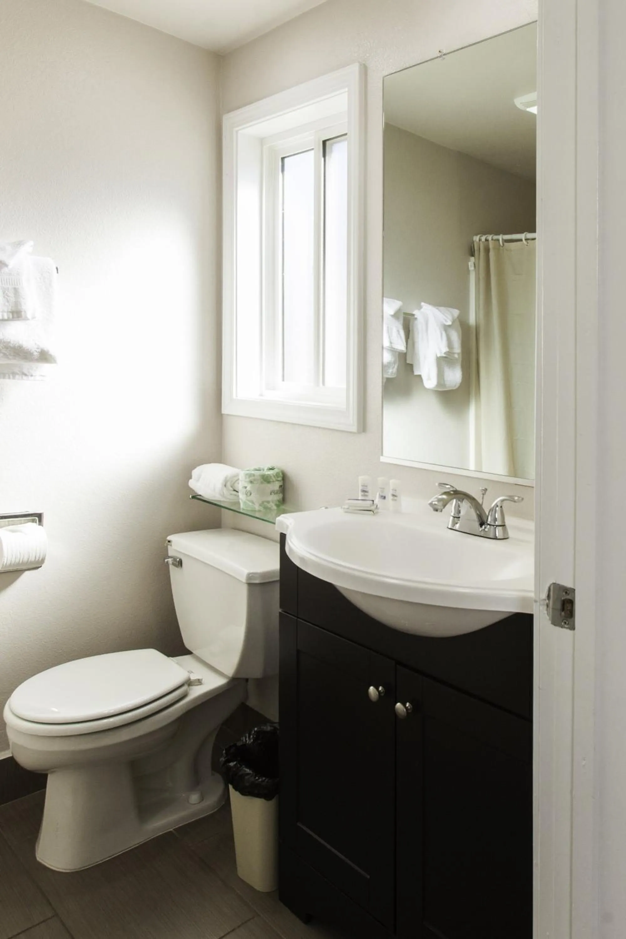 Toilet in Tri-Valley Inn & Suites