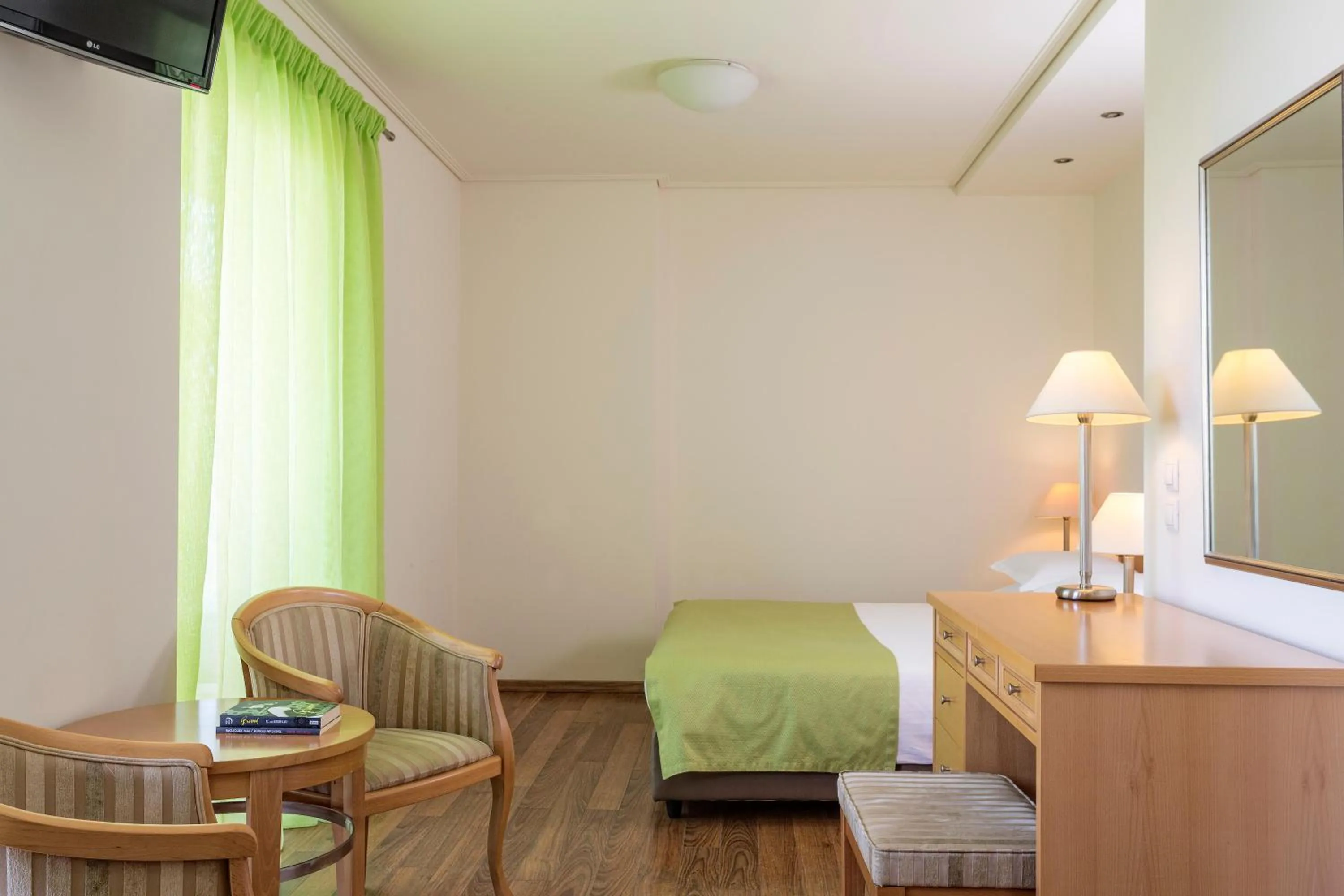 Photo of the whole room in Civitel Attik Rooms & Suites