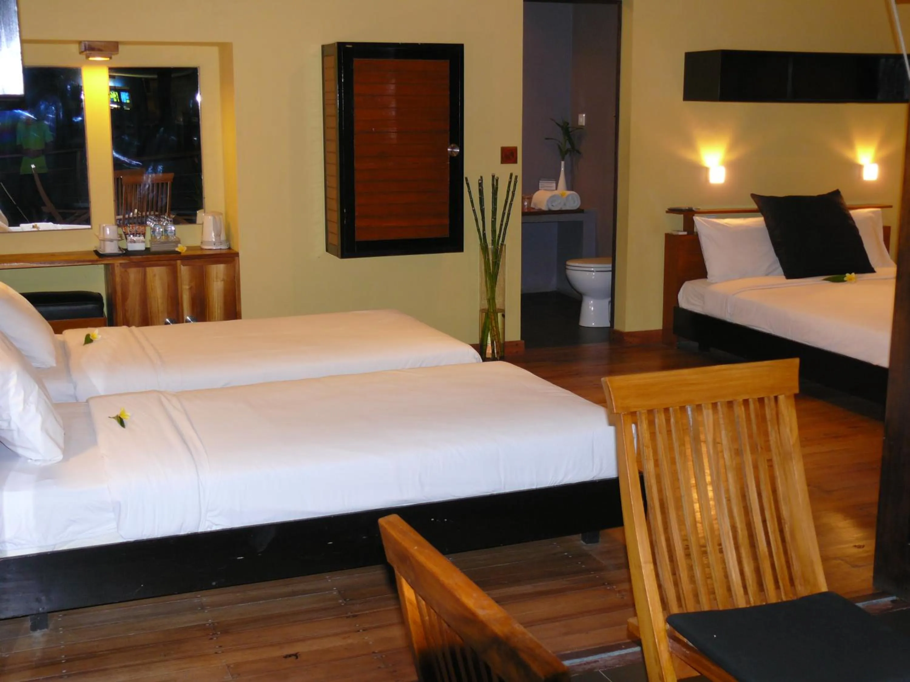 Photo of the whole room, Bed in JavaCove Beach Hotel